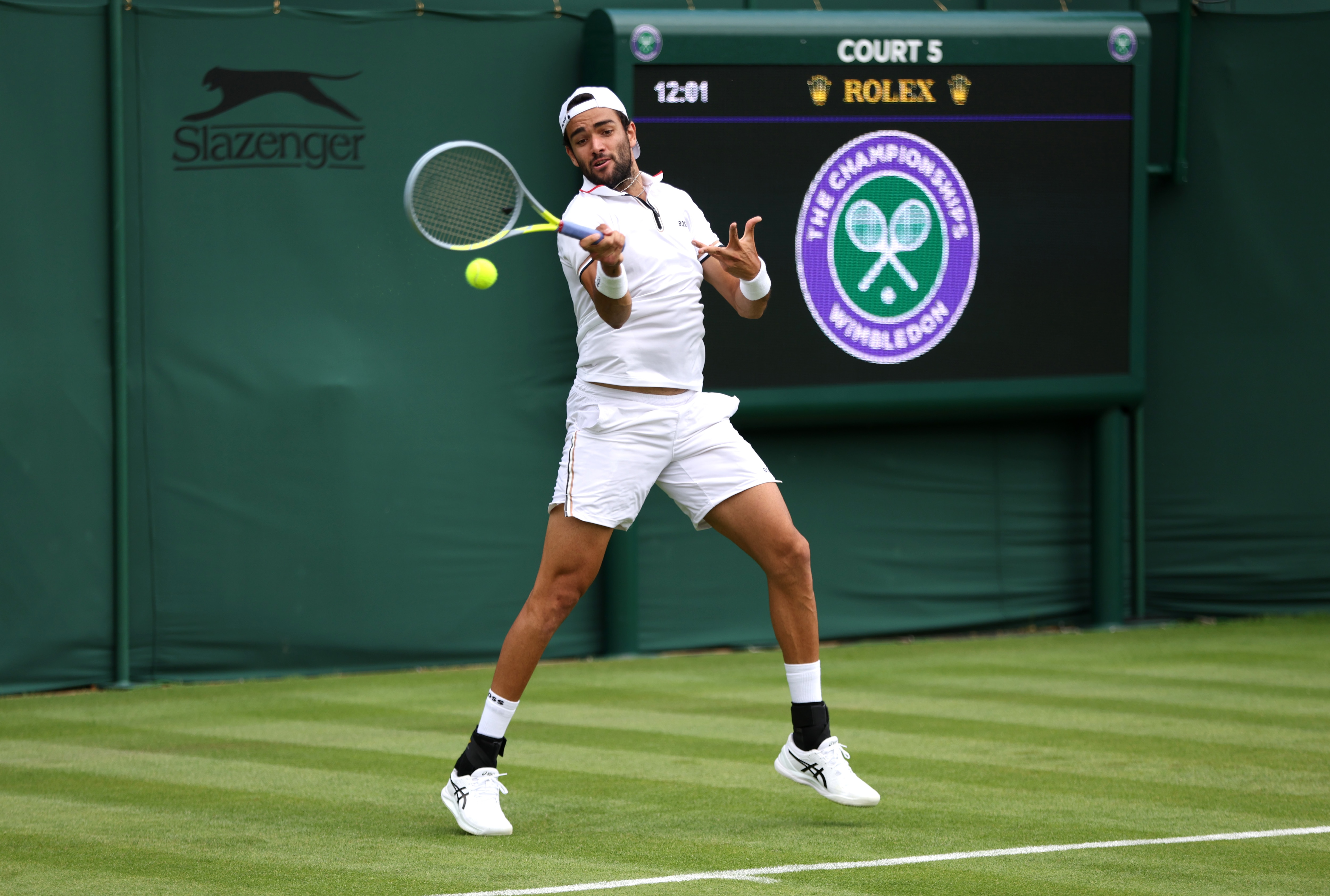 LONDON, ENGLAND - JUNE 24: Matteo Berrettini of Italy plays a forehand during a practice session ahead of The Championships Wimbledon 2022 at All England Lawn Tennis and Croquet Club on June 24, 2022 in London, England. (Photo by Clive Brunskill/Getty Images)