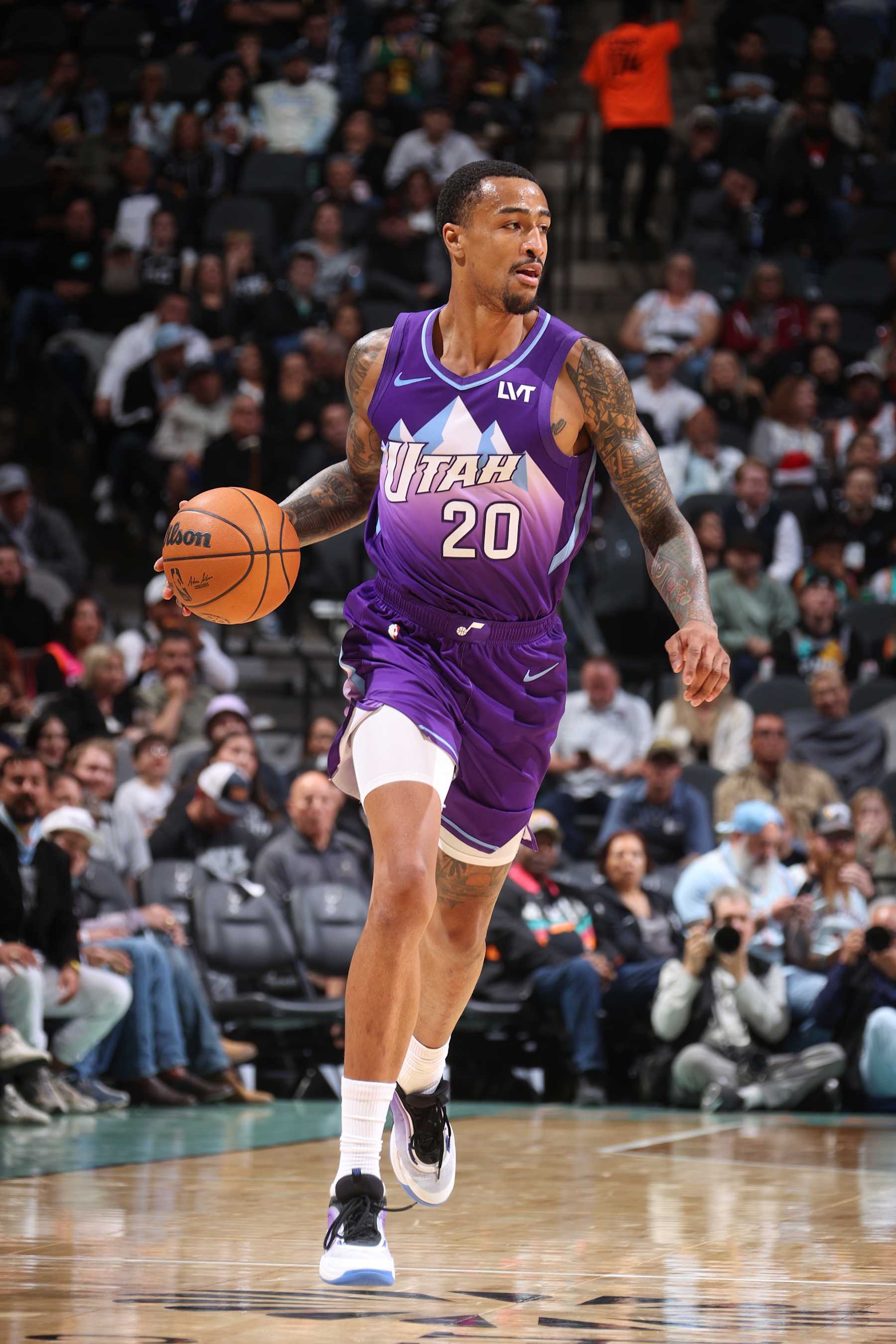 SAN ANTONIO, TX - NOVEMBER 21: John Collins #20 of the Utah Jazz dribbles the ball during the game against the San Antonio Spurs on November 21, 2024 at the Frost Bank Center in San Antonio, Texas. NOTE TO USER: User expressly acknowledges and agrees that, by downloading and or using this photograph, user is consenting to the terms and conditions of the Getty Images License Agreement. Mandatory Copyright Notice: Copyright 2024 NBAE (Photos by Nathaniel S. Butler/NBAE via Getty Images)