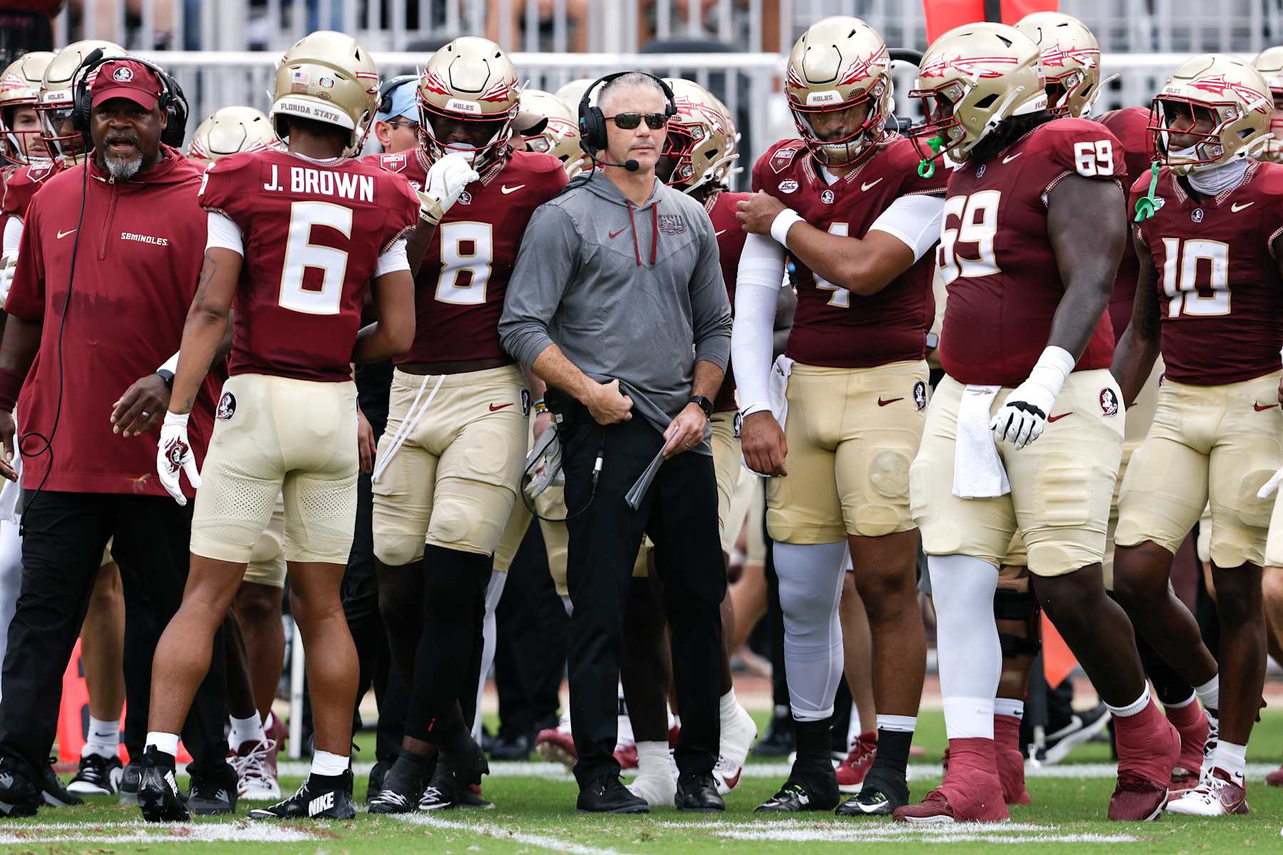 TALLAHASSEE, FL - SEPTEMBER 14: Head Coach Mike Norvell talk with Quarterback DJ Uiagalelei #4 of the Florida State Seminoles before taking the field during the game against the Memphis Tigers at Doak Campbell Stadium on Bobby Bowden Field on September 14, 2024 in Tallahassee, Florida. The Tigers defeated the Seminoles 20 to 12. (Photo by Don Juan Moore/Getty Images)
