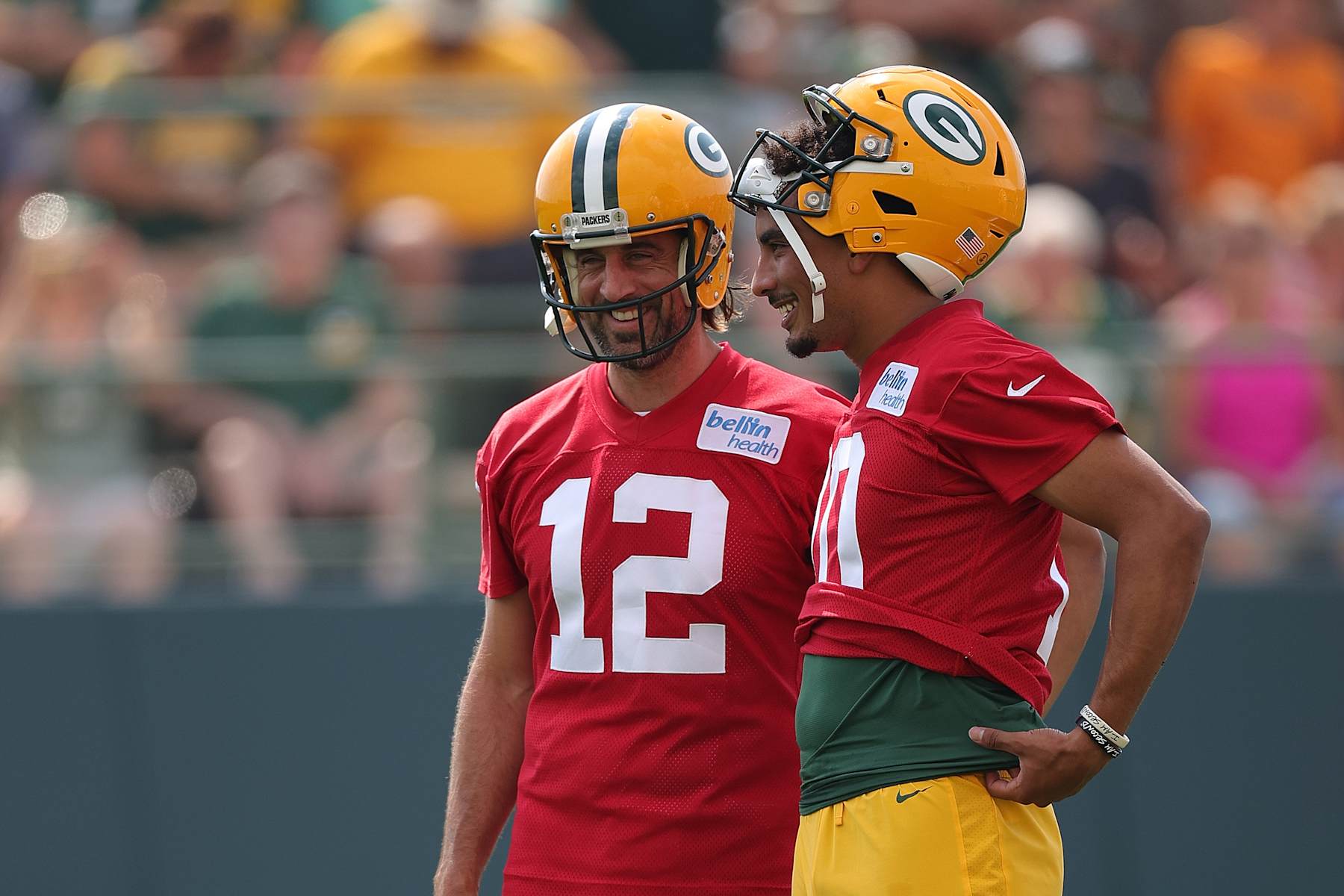 ASHWAUBENON, WISCONSIN - JULY 29: Jordan Love #10 and Aaron Rodgers #12 of the Green Bay Packers work out during training camp at Ray Nitschke Field on July 29, 2021 in Ashwaubenon, Wisconsin. (Photo by Stacy Revere/Getty Images)
