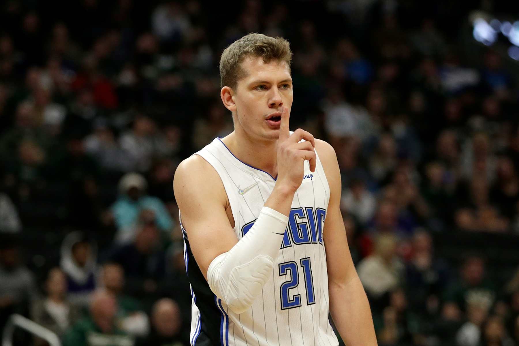 MILWAUKEE, WISCONSIN - NOVEMBER 20: Moritz Wagner #21 of the Orlando Magic tells a teammate to keep quiet after a call during the second half of the game against the Milwaukee Bucks at Fiserv Forum on November 20, 2021 in Milwaukee, Wisconsin. NOTE TO USER: User expressly acknowledges and agrees that, by downloading and or using this photograph, User is consenting to the terms and conditions of the Getty Images License Agreement. (Photo by John Fisher/Getty Images)