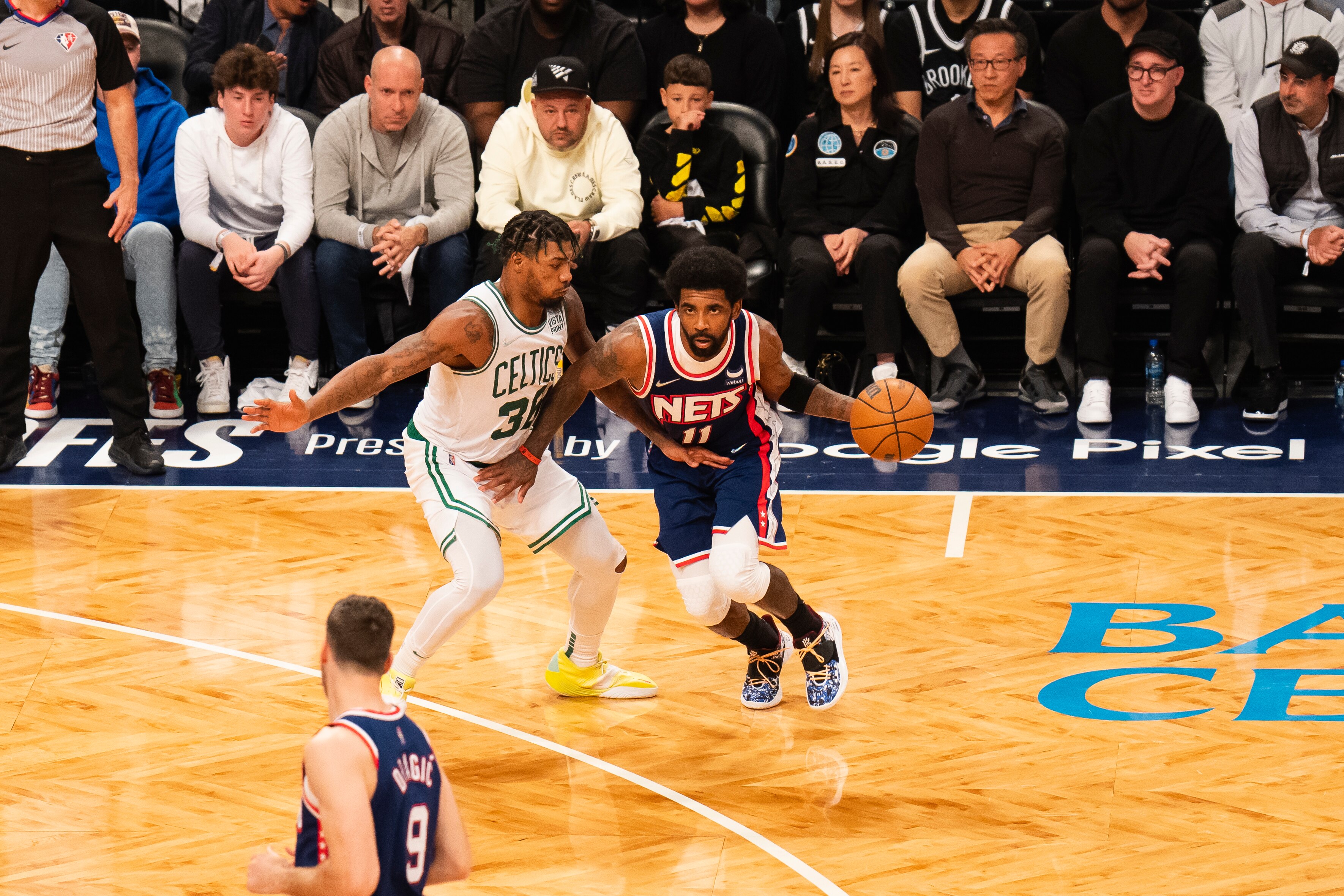 BROOKLYN, NY - APRIL 25: Marcus Smart #36 of the Boston Celtics plays defense on Kyrie Irving #11 of the Brooklyn Nets during Round 1 Game 4 of the NBA Playoffs on April 25, 2022 at the Barclays Center in Brooklyn, New York. NOTE TO USER: User expressly acknowledges and agrees that, by downloading and/or using this photograph, user is consenting to the terms and conditions of the Getty Images License Agreement. Mandatory Copyright Notice: Copyright 2022 NBAE (Photo by Evan Yu/NBAE via Getty Images)