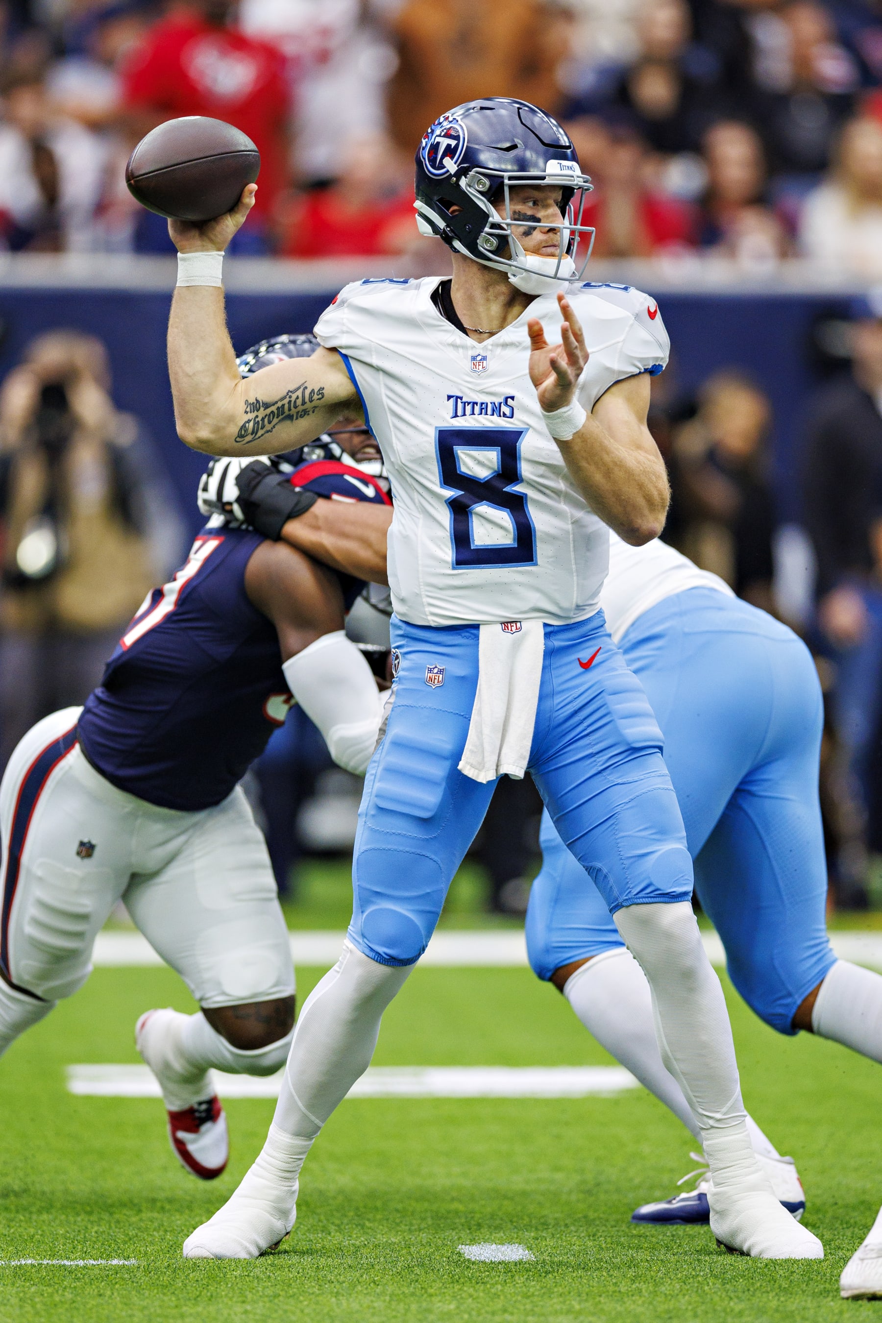 HOUSTON, TEXAS - DECEMBER 31: Will Levis #8 of the Tennessee Titans throws a pass during the game against the Houston Texans at NRG Stadium on December 31, 2023 in Houston, Texas. The Texans defeated the Titans 26-3.  (Photo by Wesley Hitt/Getty Images)