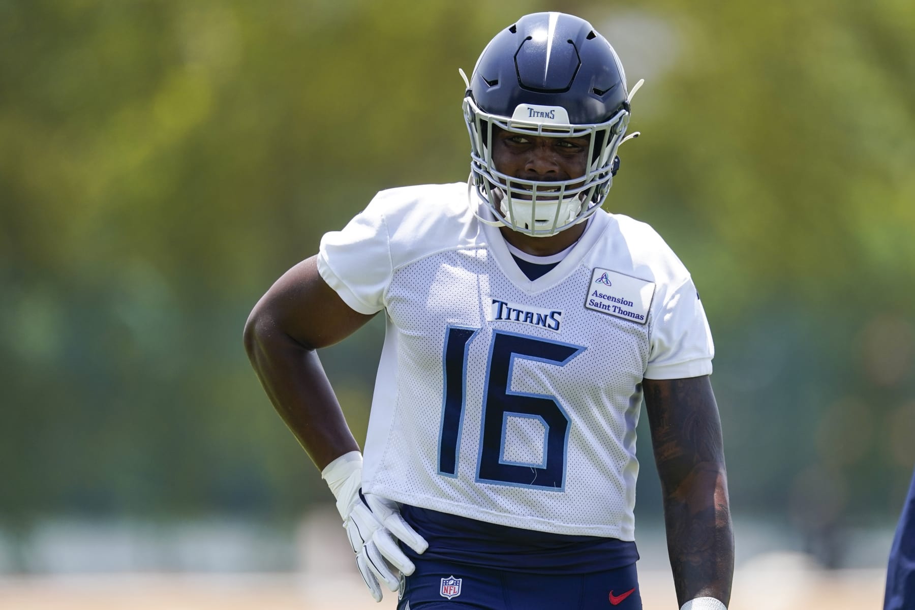 Tennessee Titans wide receiver Treylon Burks (16) walks across the field during practice at the NFL football team's training facility Tuesday, June 6, 2023, in Nashville, Tenn. (AP Photo/George Walker IV) Tennessee Titans wide receiver Treylon Burks (16) walks across the field during practice at the NFL football team's training facility Tuesday, June 6, 2023, in Nashville, Tenn. (AP Photo/George Walker IV)