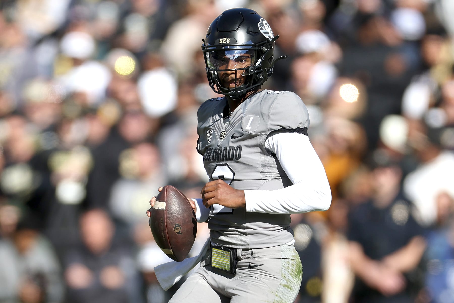 BOULDER, COLORADO - NOVEMBER 11: Quarterback Shedeur Sanders #2 of the Colorado Buffaloes runs out of the pocket against the Arizona Wildcats in the first quarter at Folsom Field on November 11, 2023 in Boulder, Colorado. (Photo by Matthew Stockman/Getty Images)