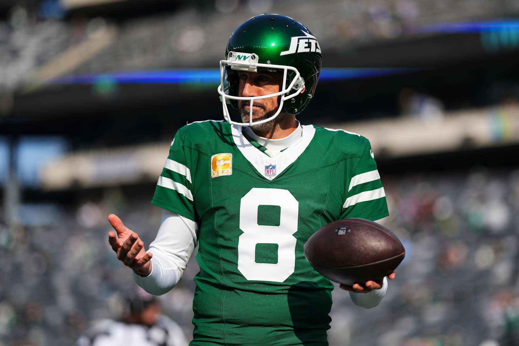 EAST RUTHERFORD, NJ - NOVEMBER 17: Aaron Rodgers #8 of the New York Jets warms up prior to an NFL football game against the Indianapolis Colts at MetLife Stadium on November 17, 2024 in East Rutherford, New Jersey. (Photo by Cooper Neill/Getty Images)