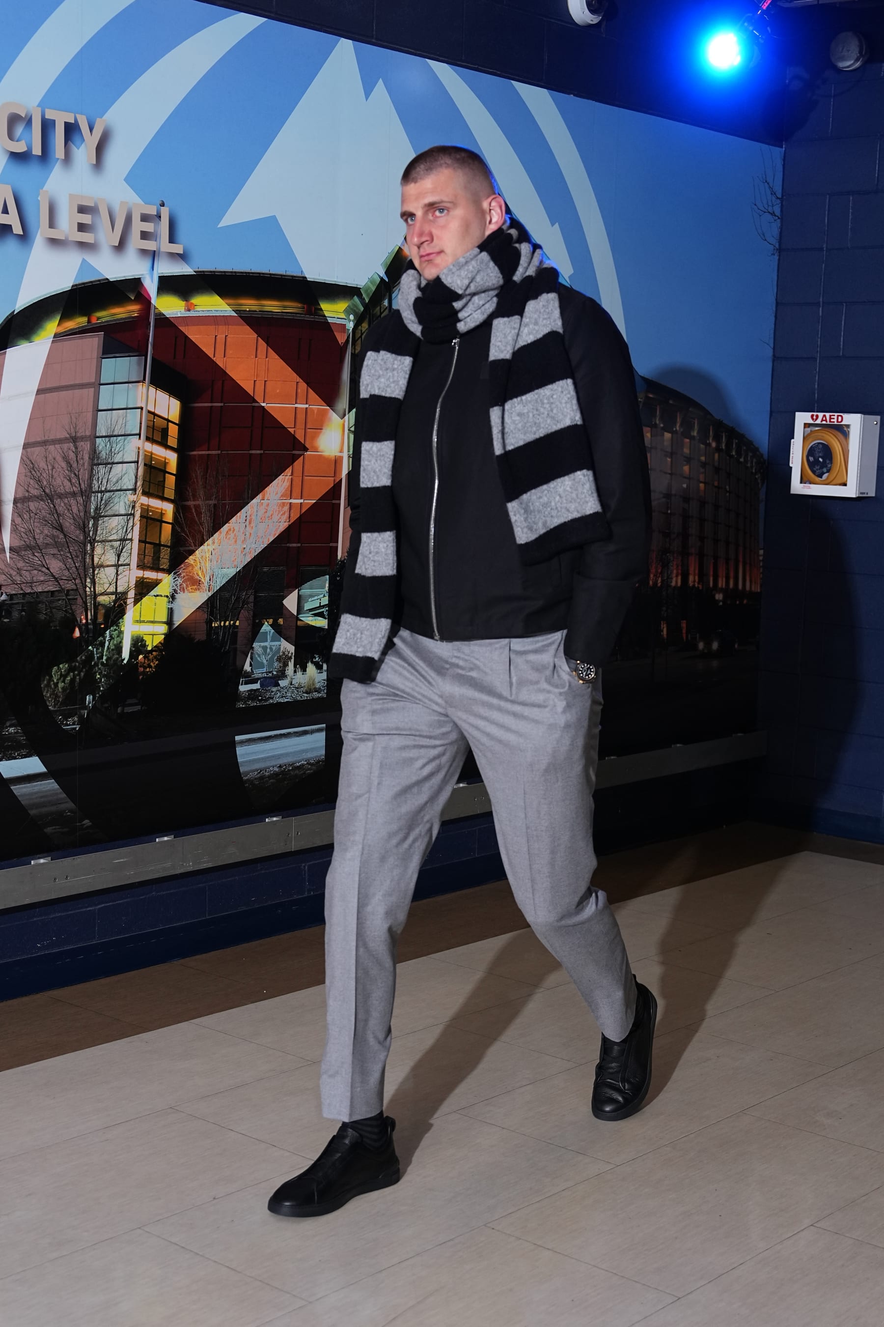 DENVER, CO - APRIL 20: Nikola Jokic #15 of the Denver Nuggets arrives to the arena before the game against the Los Angeles Lakers during Round 1 Game 1 of the 2024 NBA Playoffs on April 20, 2024 at the Ball Arena in Denver, Colorado. NOTE TO USER: User expressly acknowledges and agrees that, by downloading and/or using this Photograph, user is consenting to the terms and conditions of the Getty Images License Agreement. Mandatory Copyright Notice: Copyright 2024 NBAE (Photo by Garrett Ellwood/NBAE via Getty Images)