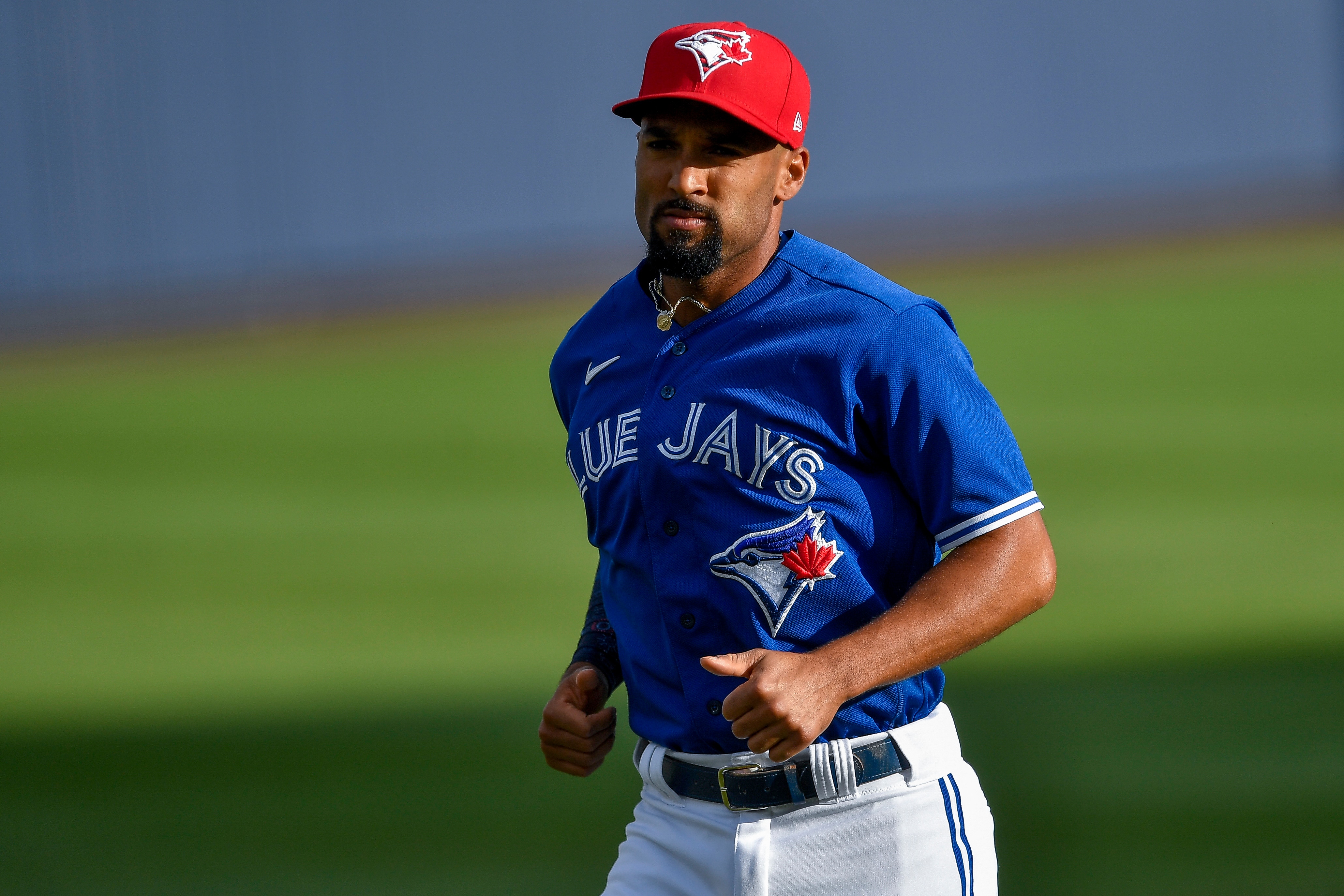 Toronto Blue Jays second baseman Marcus Semien (10) warms up before a baseball game against the Tampa Bay Rays in Buffalo, N.Y., Friday, July 2, 2021. (AP Photo/Adrian Kraus)