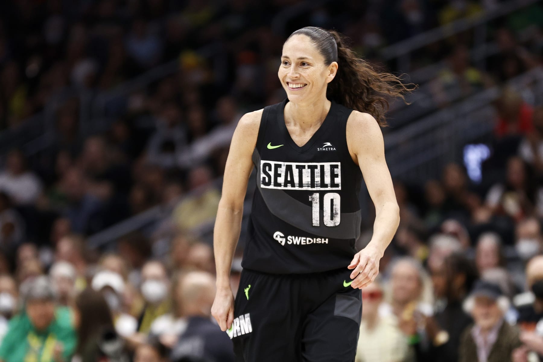 SEATTLE, WASHINGTON - AUGUST 07: Sue Bird #10 of the Seattle Storm looks on during the first quarter of her last regular season home game of her career against the Las Vegas Aces at Climate Pledge Arena on August 07, 2022 in Seattle, Washington. (Photo by Steph Chambers/Getty Images)