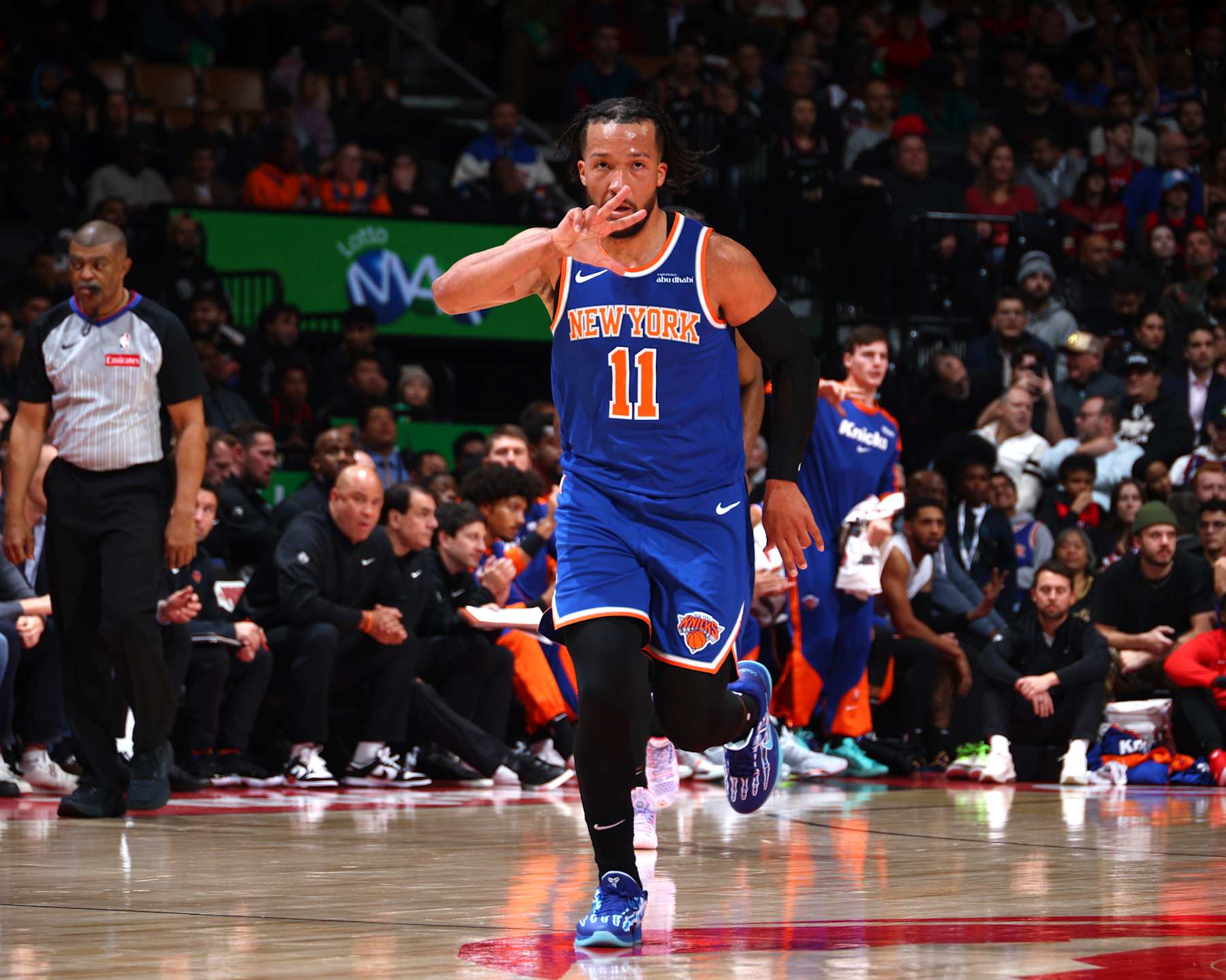TORONTO, CANADA - DECEMBER 9: Jalen Brunson #11 of the New York Knicks celebrates three point basket during the game against the Toronto Raptors on December 9, 2024 at the Scotiabank Arena in Toronto, Ontario, Canada.  NOTE TO USER: User expressly acknowledges and agrees that, by downloading and or using this Photograph, user is consenting to the terms and conditions of the Getty Images License Agreement.  Mandatory Copyright Notice: Copyright 2024 NBAE (Photo by Vaughn Ridley/NBAE via Getty Images)
