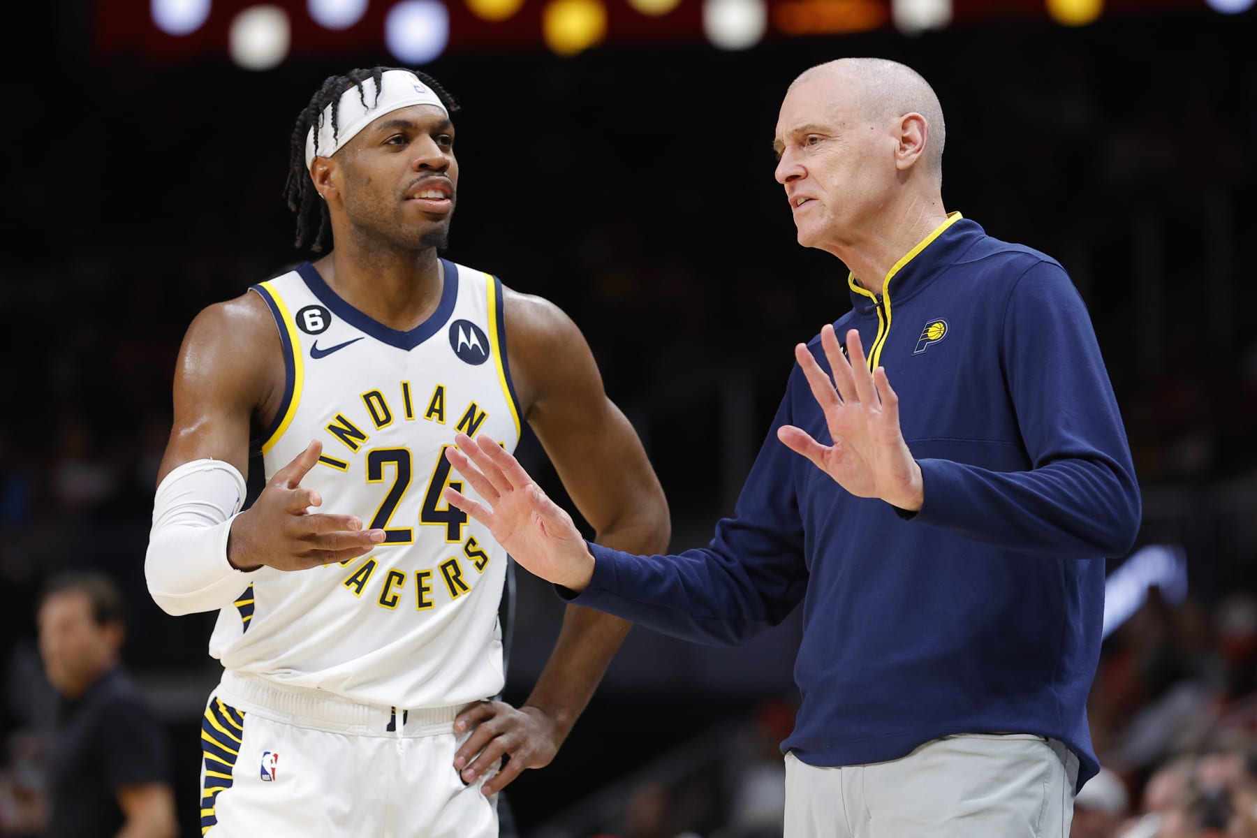 ATLANTA, GA - MARCH 25: Head coach Rick Carlisle of the Indiana Pacers speaks with Buddy Hield #24 during the first half against the Atlanta Hawks at State Farm Arena on March 25, 2023 in Atlanta, Georgia. NOTE TO USER: User expressly acknowledges and agrees that, by downloading and or using this photograph, User is consenting to the terms and conditions of the Getty Images License Agreement. (Photo by Todd Kirkland/Getty Images)