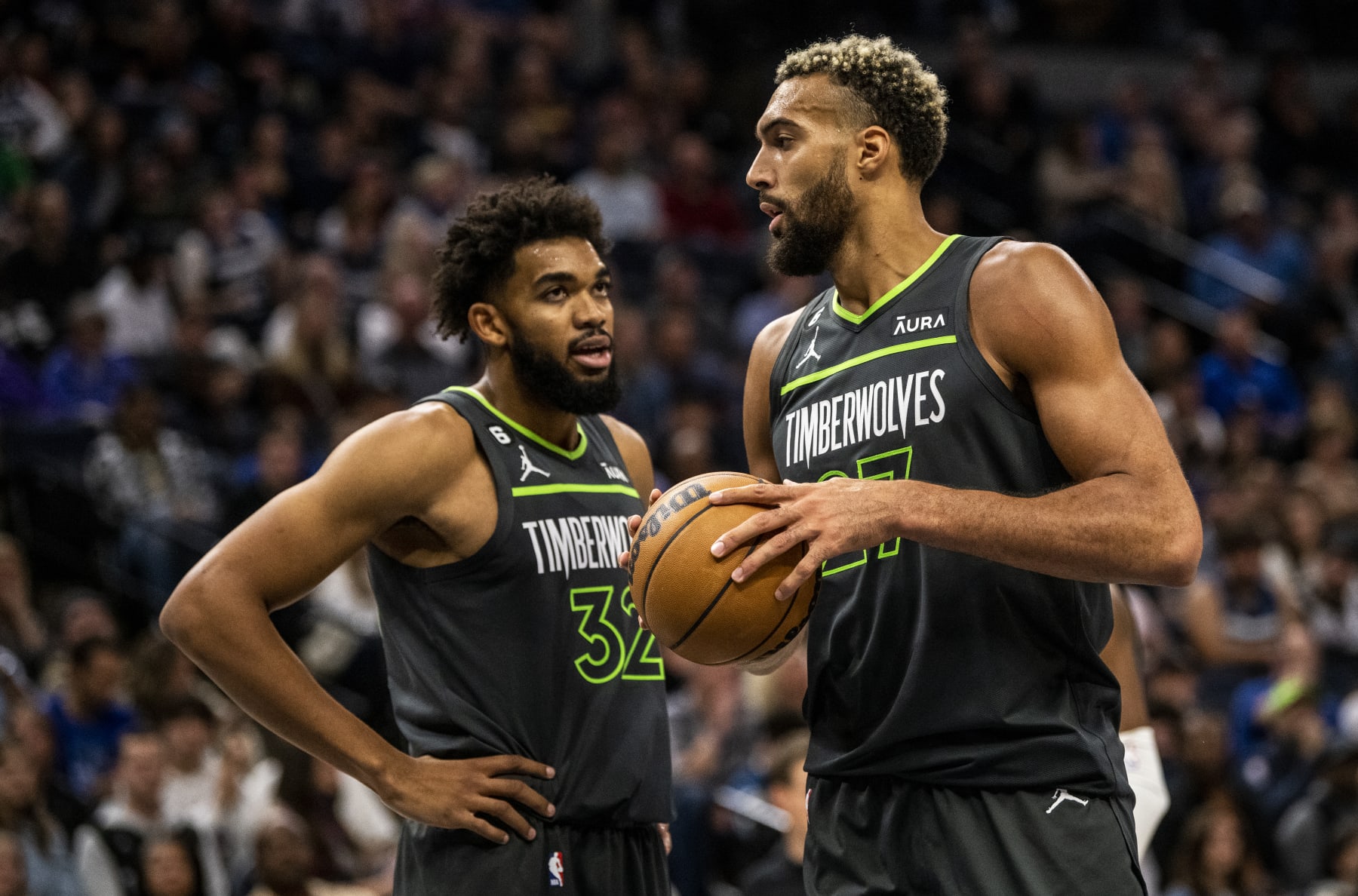 MINNEAPOLIS, MN - OCTOBER 21: Rudy Gobert #27 of the Minnesota Timberwolves and Karl-Anthony Towns #32 react after a play in the fourth quarter of the game against the Utah Jazz at Target Center on October 21, 2022 in Minneapolis, Minnesota. NOTE TO USER: User expressly acknowledges and agrees that, by downloading and or using this photograph, User is consenting to the terms and conditions of the Getty Images License Agreement. (Photo by Stephen Maturen/Getty Images)