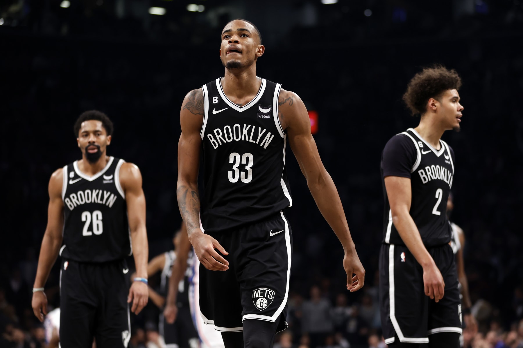NEW YORK, NEW YORK - APRIL 20: Spencer Dinwiddie #26, Nic Claxton #33, and Cameron Johnson #2 of the Brooklyn Nets react against the Philadelphia 76ers during the second half of Game Three of the Eastern Conference First Round Playoffs at Barclays Center on April 20, 2023 in the Brooklyn borough of New York City. The 76ers won 102-97. NOTE TO USER: User expressly acknowledges and agrees that, by downloading and or using this photograph, User is consenting to the terms and conditions of the Getty Images License Agreement. (Photo by Sarah Stier/Getty Images)