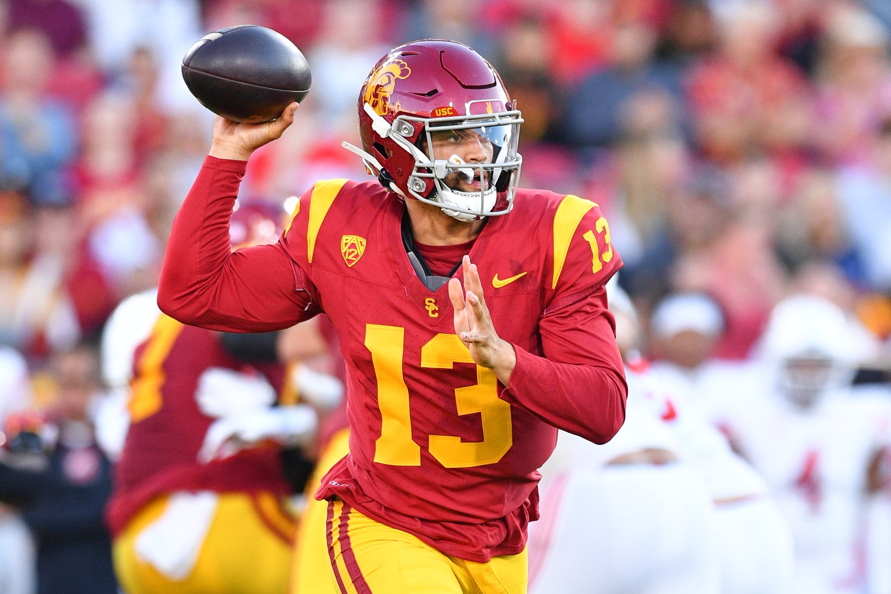 LOS ANGELES, CA - OCTOBER 21: USC Trojans quarterback Caleb Williams (13) throws a pass during a game between the Utah Utes and the USC Trojans on October 21, 2023, at Los Angeles Memorial Coliseum in Los Angeles, CA. (Photo by Brian Rothmuller/Icon Sportswire via Getty Images)