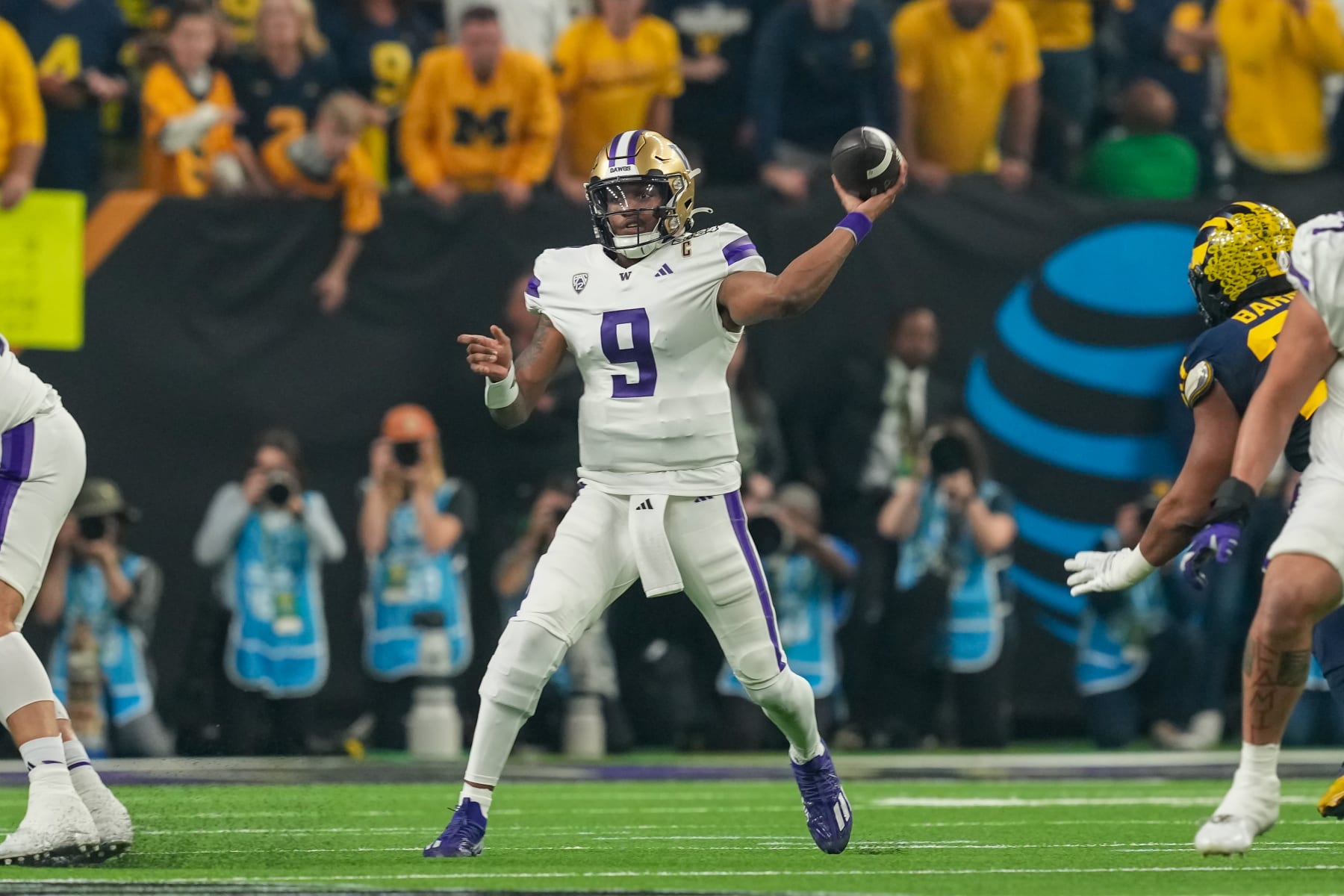 HOUSTON, TX - JANUARY 08: Washington Huskies quarterback Michael Penix Jr. (9) throws a pass during the CFP National Championship game between the Michigan Wolverines and Washington Huskies on January 8, 2024 at NRG Stadium in Houston, Texas. (Photo by Daniel Dunn/Icon Sportswire via Getty Images)