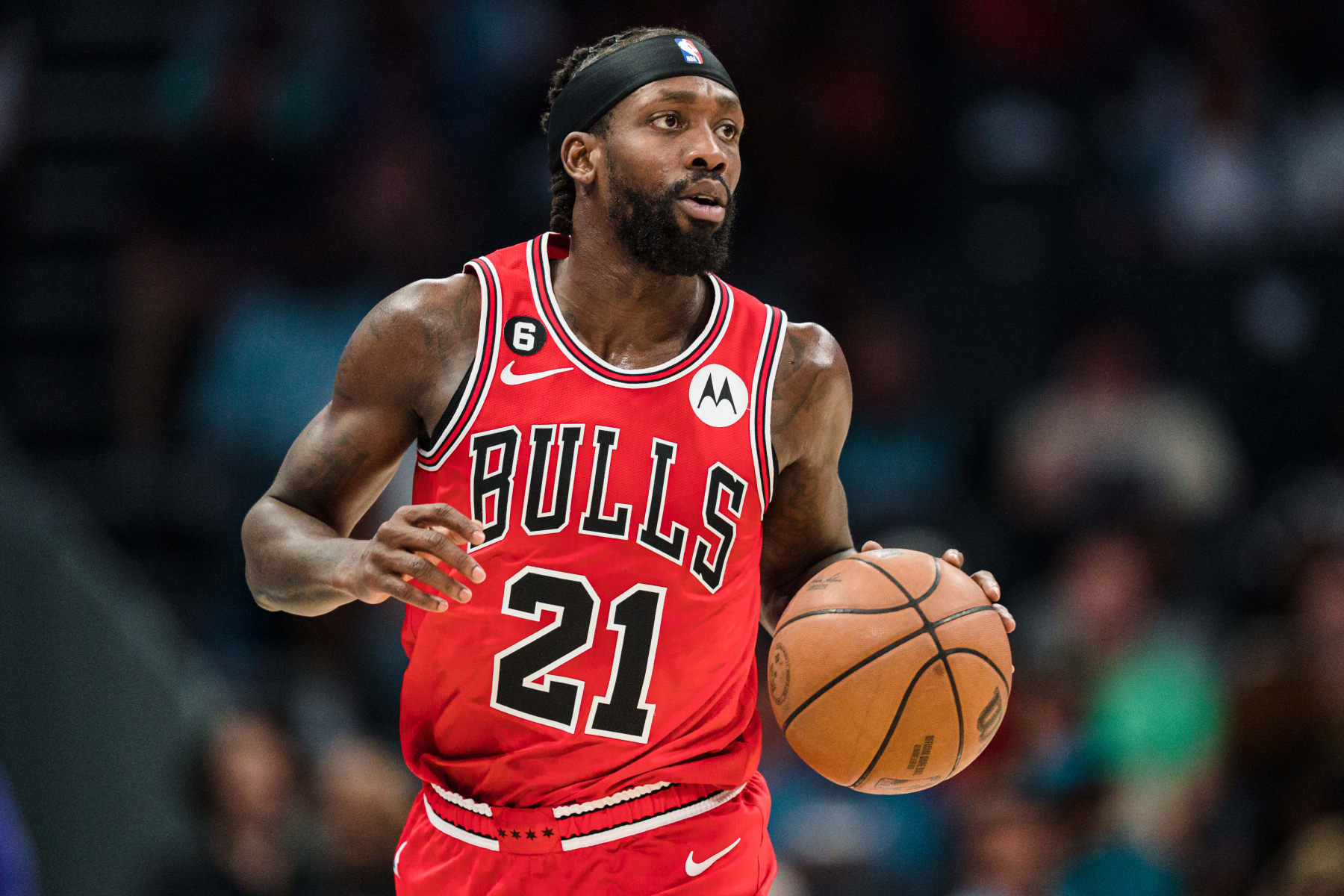 CHARLOTTE, NORTH CAROLINA - MARCH 31: Patrick Beverley #21 of the Chicago Bulls brings the ball up court against the Charlotte Hornets in the first quarter at Spectrum Center on March 31, 2023 in Charlotte, North Carolina. NOTE TO USER: User expressly acknowledges and agrees that, by downloading and or using this photograph, User is consenting to the terms and conditions of the Getty Images License Agreement. (Photo by Jacob Kupferman/Getty Images)