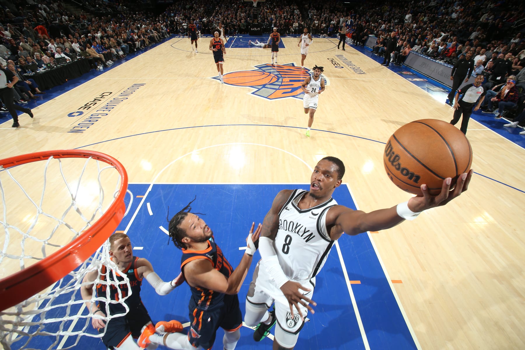 NEW YORK, NY - APRIL 12: Lonnie Walker IV #8 of the Brooklyn Nets drives to the basket during the game against the New York Knicks on April 12, 2024 at Madison Square Garden in New York City, New York.  NOTE TO USER: User expressly acknowledges and agrees that, by downloading and or using this photograph, User is consenting to the terms and conditions of the Getty Images License Agreement. Mandatory Copyright Notice: Copyright 2024 NBAE  (Photo by Nathaniel S. Butler/NBAE via Getty Images)