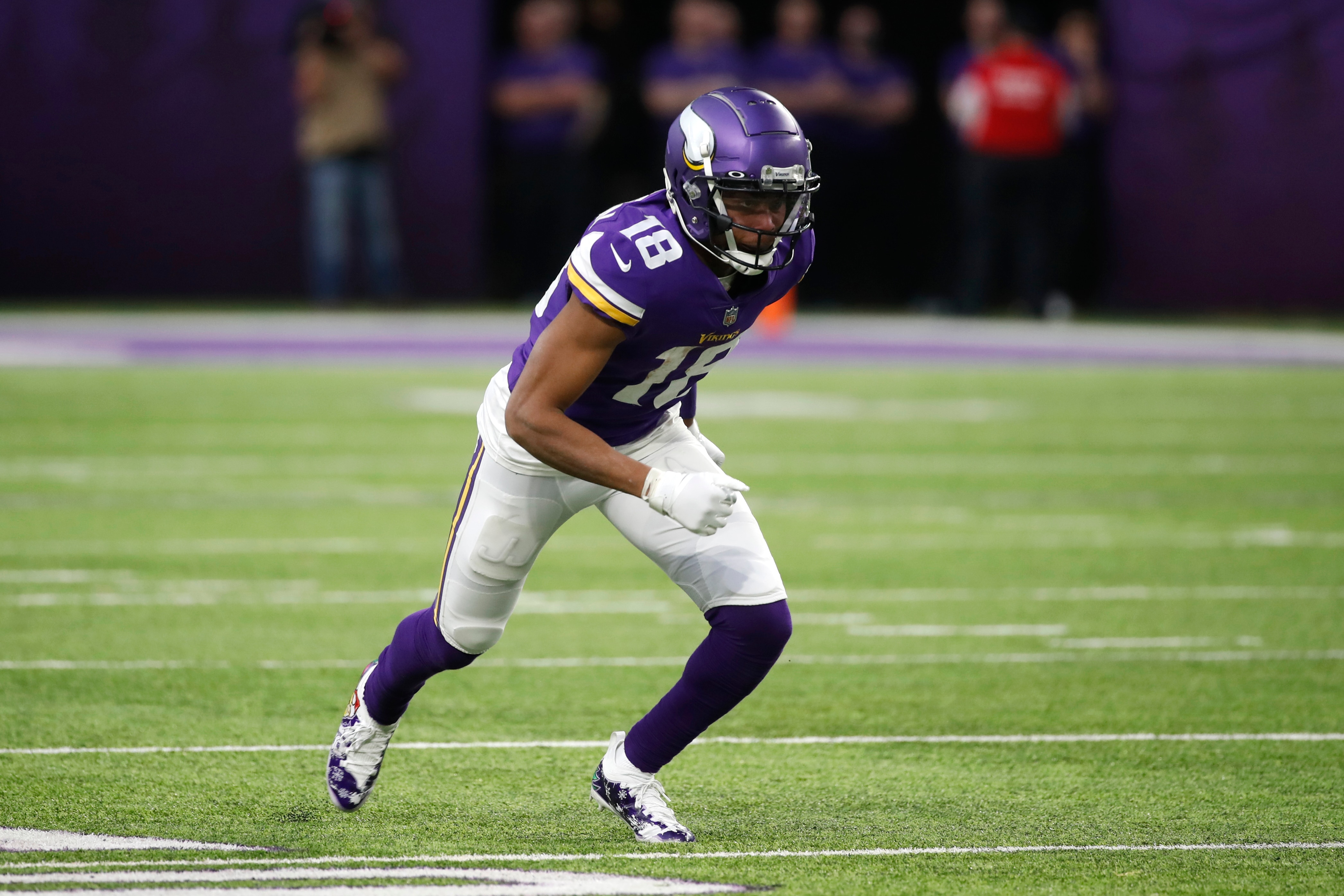 Minnesota Vikings wide receiver Justin Jefferson (18) runs up field during the second half of an NFL football game against the Los Angeles Rams, Sunday, Dec. 26, 2021, in Minneapolis. (AP Photo/Bruce Kluckhohn)