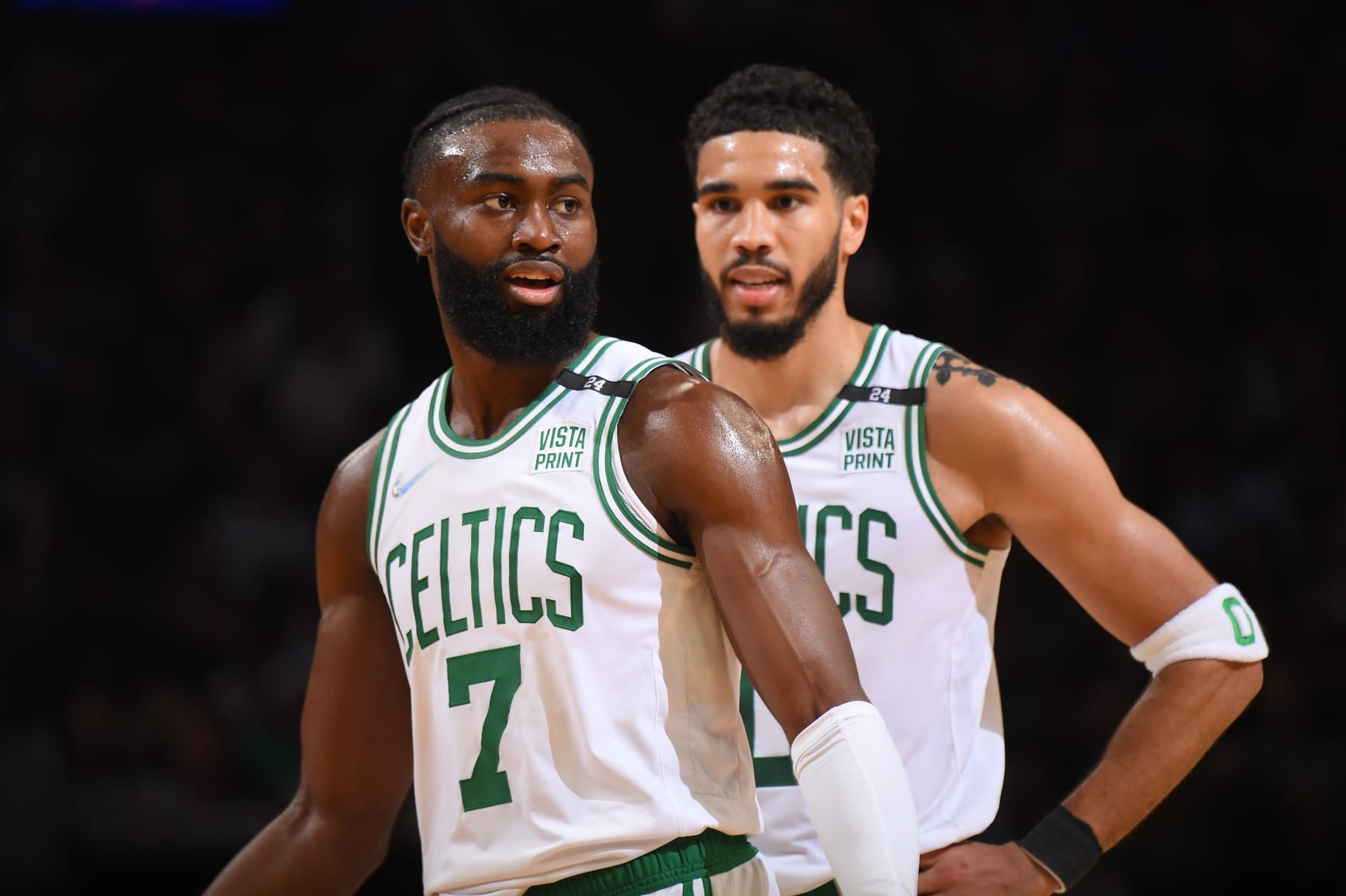 BOSTON, MA - MAY 23: Jaylen Brown #7 of the Boston Celtics and Jayson Tatum #0 look on during Game 4 of the 2022 NBA Playoffs Eastern Conference Finals on May 23, 2022 at the TD Garden in Boston, Massachusetts.  NOTE TO USER: User expressly acknowledges and agrees that, by downloading and or using this photograph, User is consenting to the terms and conditions of the Getty Images License Agreement. Mandatory Copyright Notice: Copyright 2022 NBAE  (Photo by Brian Babineau/NBAE via Getty Images)
