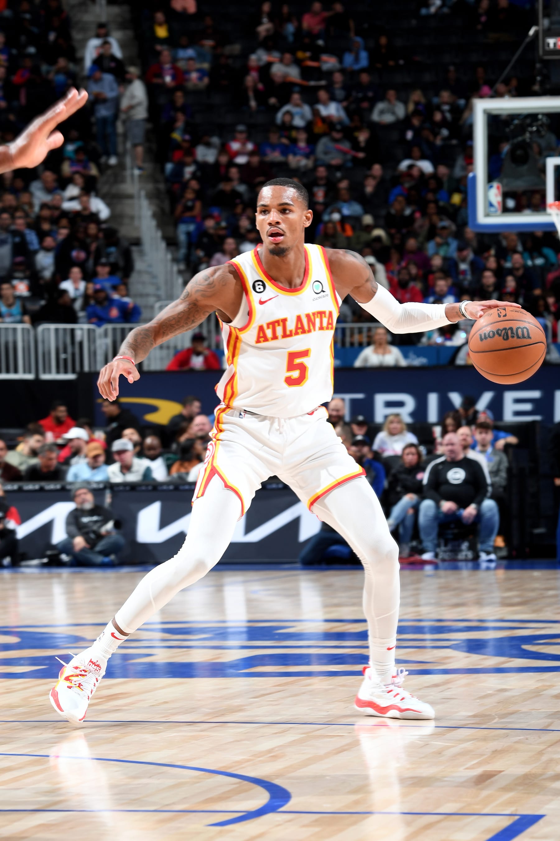 DETROIT, MI - OCTOBER 26: Dejounte Murray #5 of the Atlanta Hawks handles the ball against the Detroit Pistons on October 26, 2022 at Little Caesars Arena in Detroit, Michigan. NOTE TO USER: User expressly acknowledges and agrees that, by downloading and/or using this photograph, User is consenting to the terms and conditions of the Getty Images License Agreement. Mandatory Copyright Notice: Copyright 2022 NBAE (Photo by Chris Schwegler/NBAE via Getty Images)