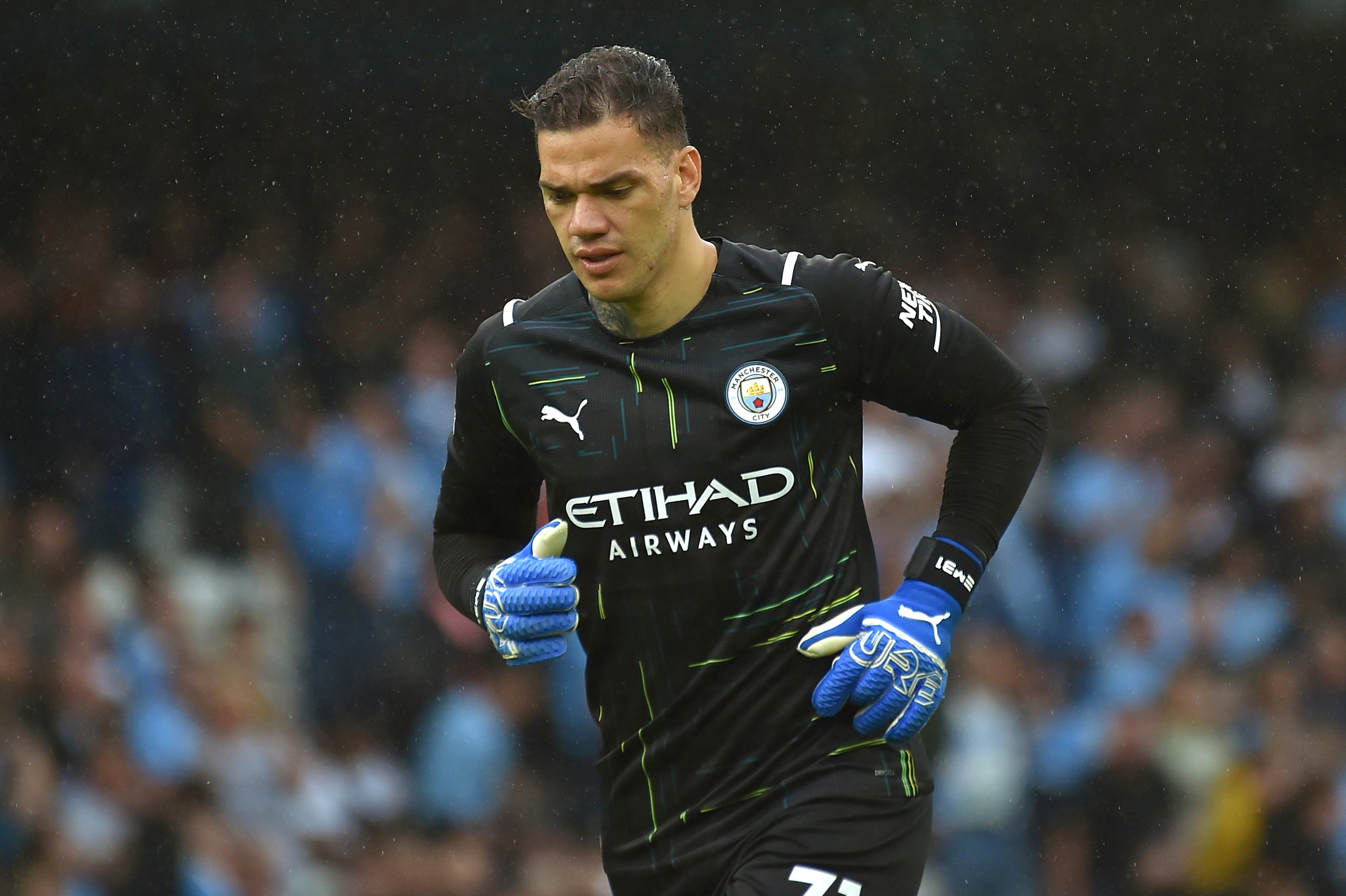 Manchester City's goalkeeper Ederson during the English Premier League soccer match between Manchester City and Norwich City at Etihad stadium in Manchester, England, Saturday, Aug. 21, 2021. (AP Photo/Rui Vieira)