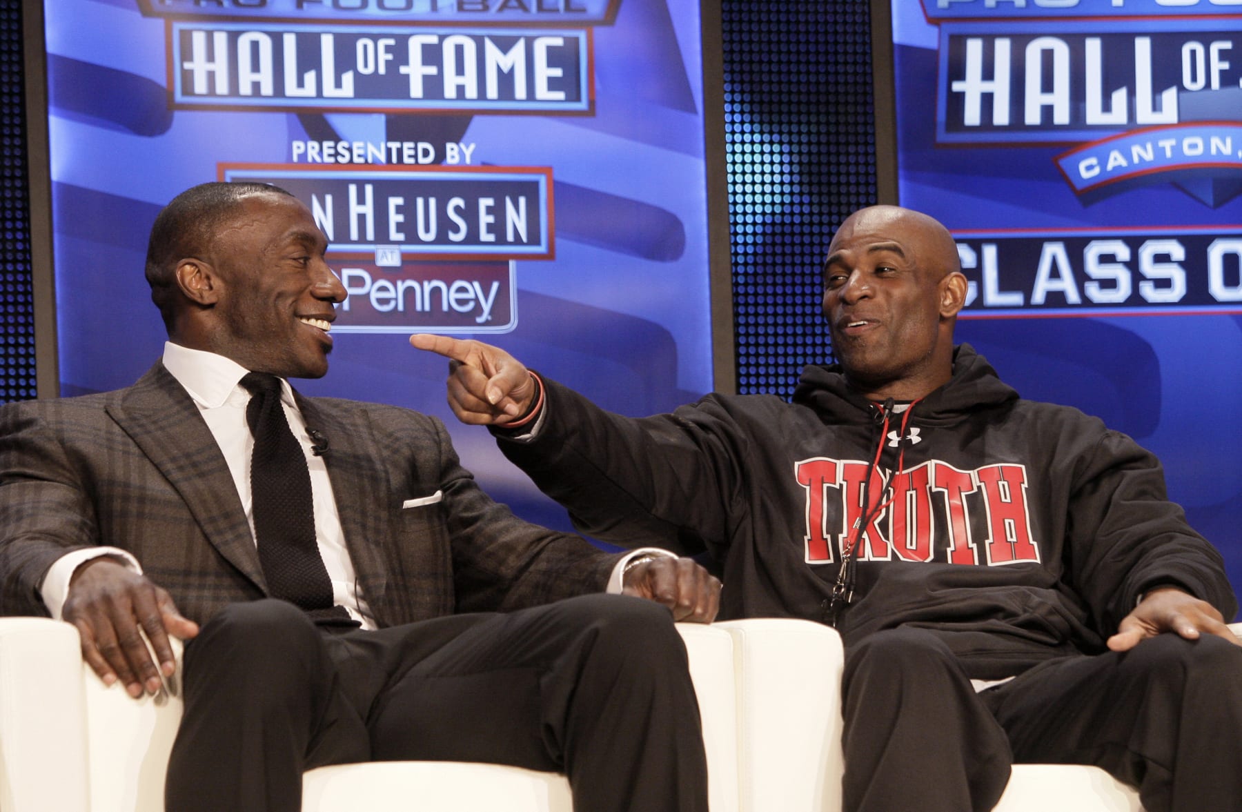 Deion Sanders, right, jokes as Shannon Sharpe, left, smiles during an interview after the duo were announced as members of the 2011 NFL Pro Football Hall of Fame class, Saturday, Feb. 5, 2011, in Dallas. Others in the 2011 class include Marshall Faulk, Richard Dent, Ed Sabol, Les Richter and Chris Hanburger. (AP Photo/Tony Gutierrez)