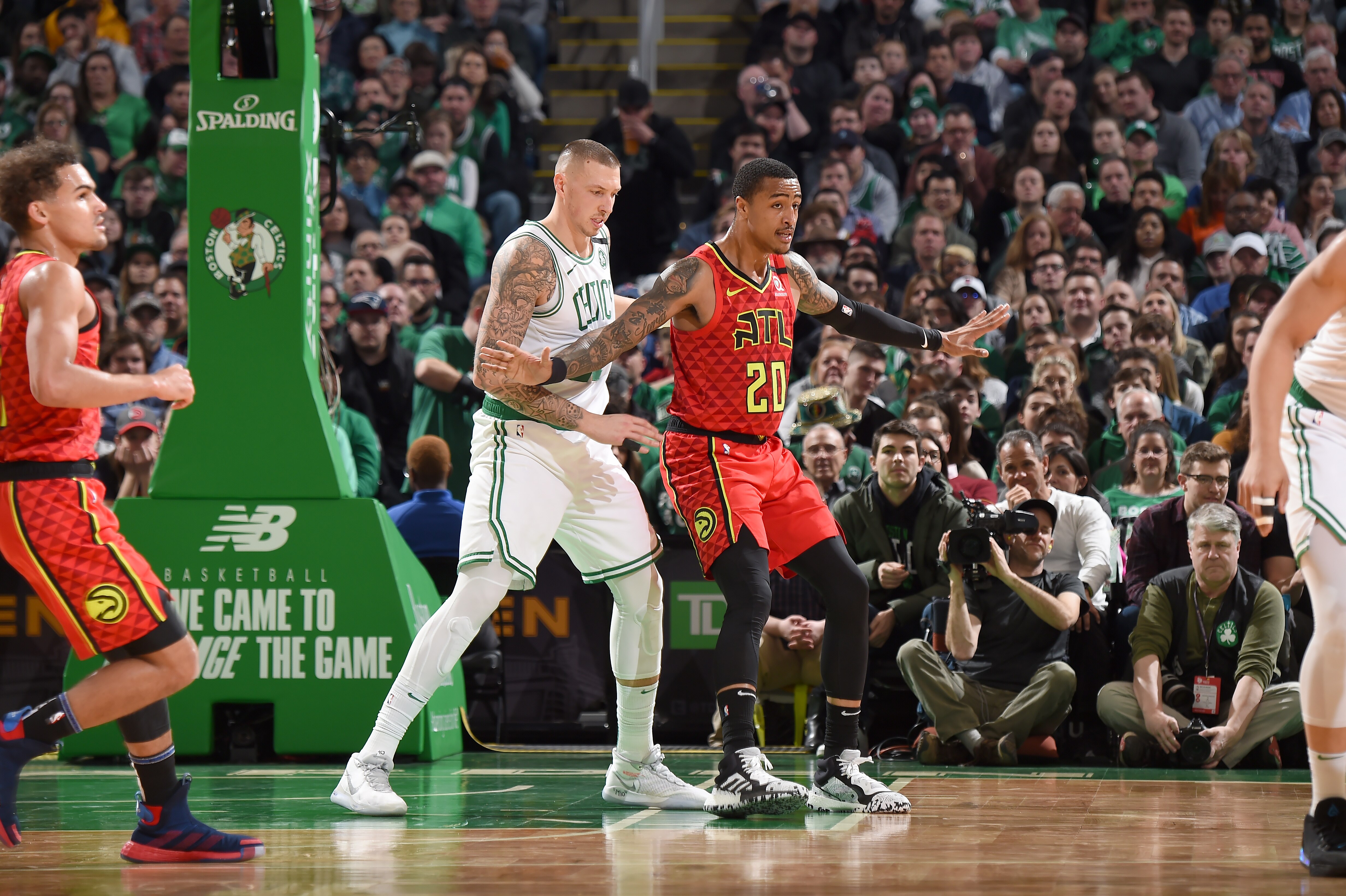 BOSTON, MA - JANUARY 3: John Collins #20 of the Atlanta Hawks plays defense against Daniel Theis #27 of the Boston Celtics on January 3, 2020 at the TD Garden in Boston, Massachusetts.  NOTE TO USER: User expressly acknowledges and agrees that, by downloading and or using this photograph, User is consenting to the terms and conditions of the Getty Images License Agreement. Mandatory Copyright Notice: Copyright 2020 NBAE  (Photo by Brian Babineau/NBAE via Getty Images)