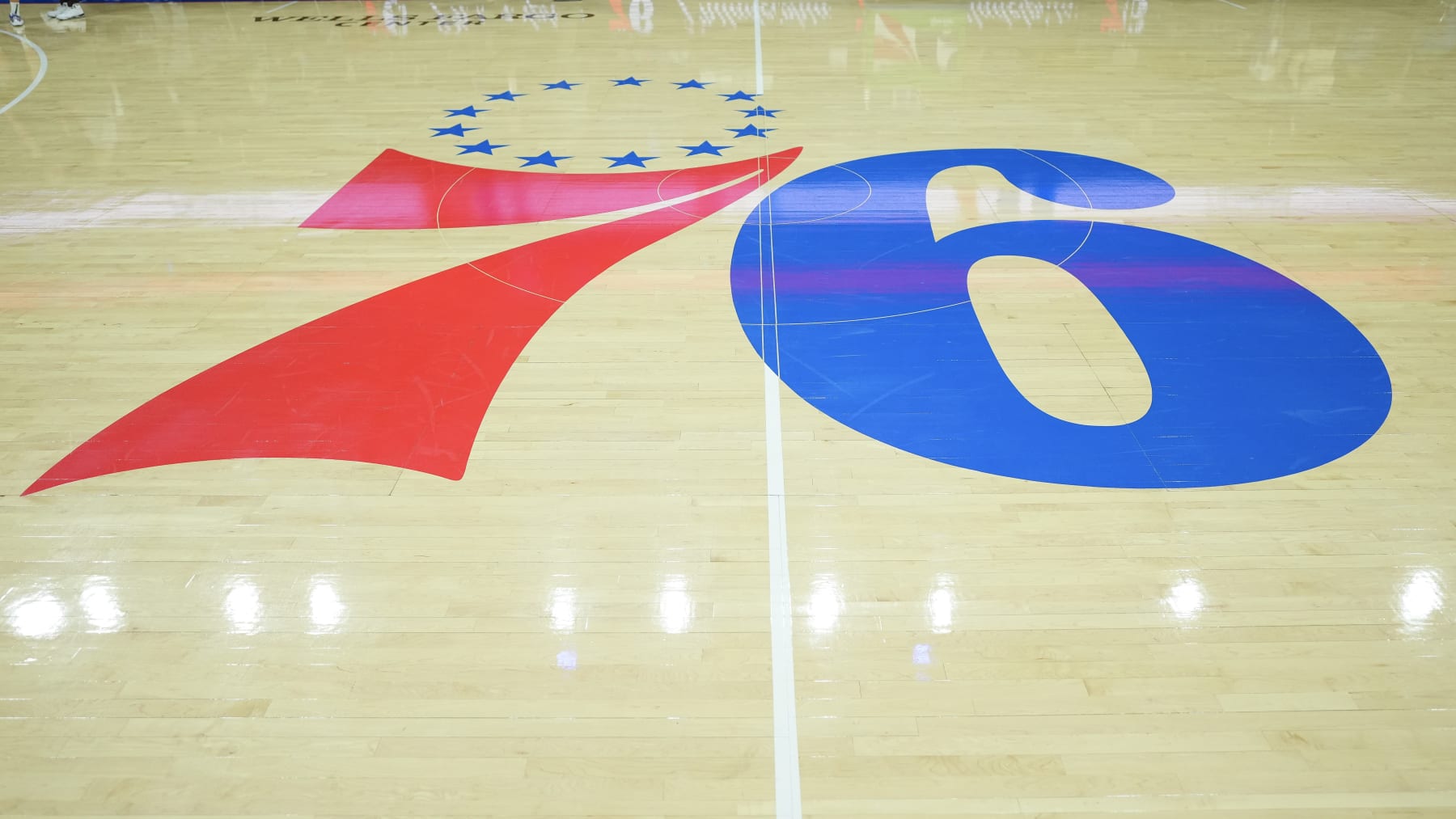 PHILADELPHIA, PA - NOVEMBER 18: A general view of the Philadelphia 76ers logo at center court prior to the game against the Milwaukee Bucks at the Wells Fargo Center on November 18, 2022 in Philadelphia, Pennsylvania. NOTE TO USER: User expressly acknowledges and agrees that, by downloading and or using this photograph, User is consenting to the terms and conditions of the Getty Images License Agreement. (Photo by Mitchell Leff/Getty Images)