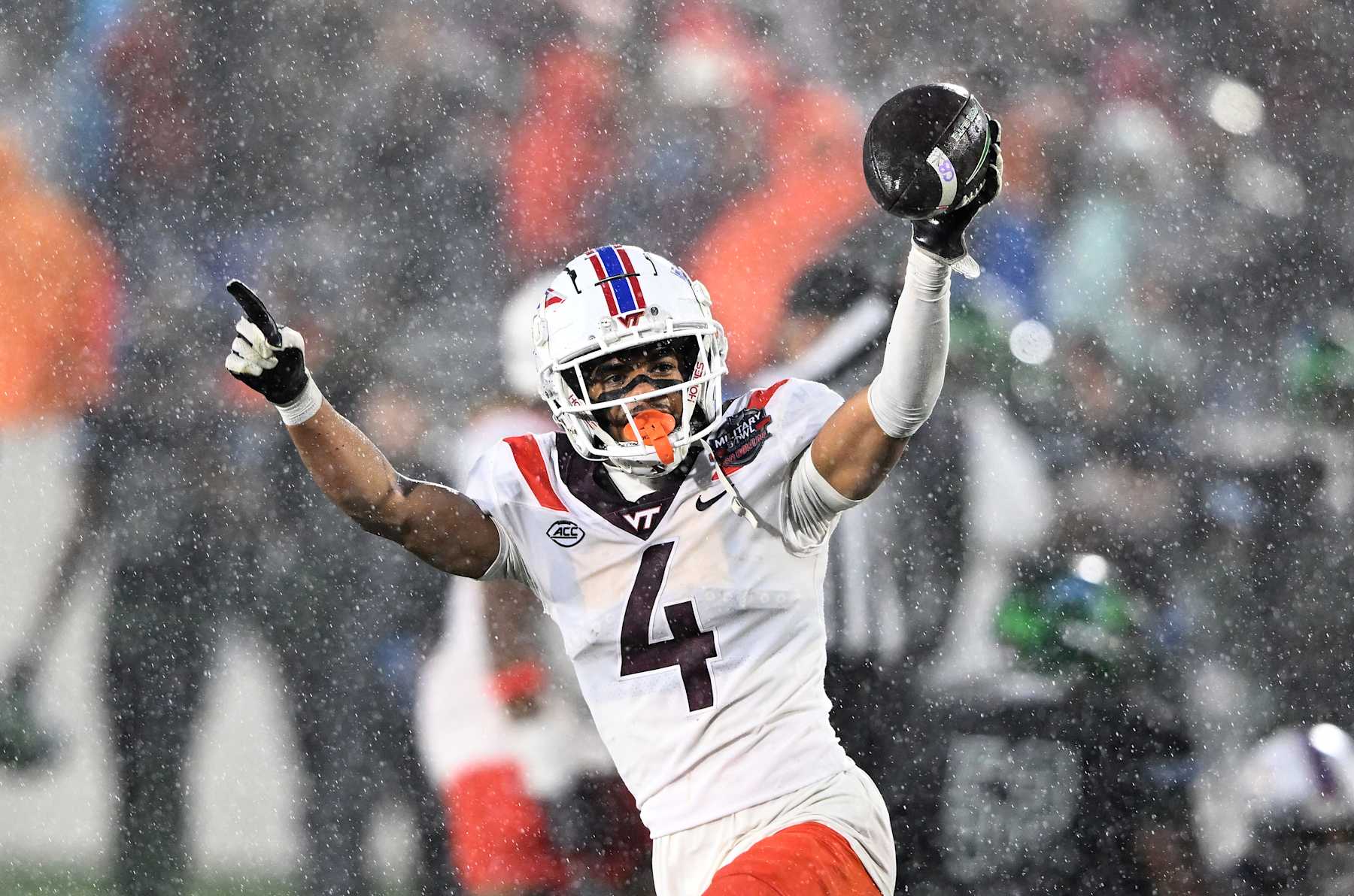 ANNAPOLIS, MARYLAND - DECEMBER 27: Mansoor Delane #4 of the Virginia Tech Hokies celebrates after recovering a fumble in the fourth quarter against the Tulane Green Wave during the Military Bowl presented by GoBowling.com  at Navy-Marine Corps Memorial Stadium on December 27, 2023 in Annapolis, Maryland. (Photo by Greg Fiume/Getty Images)