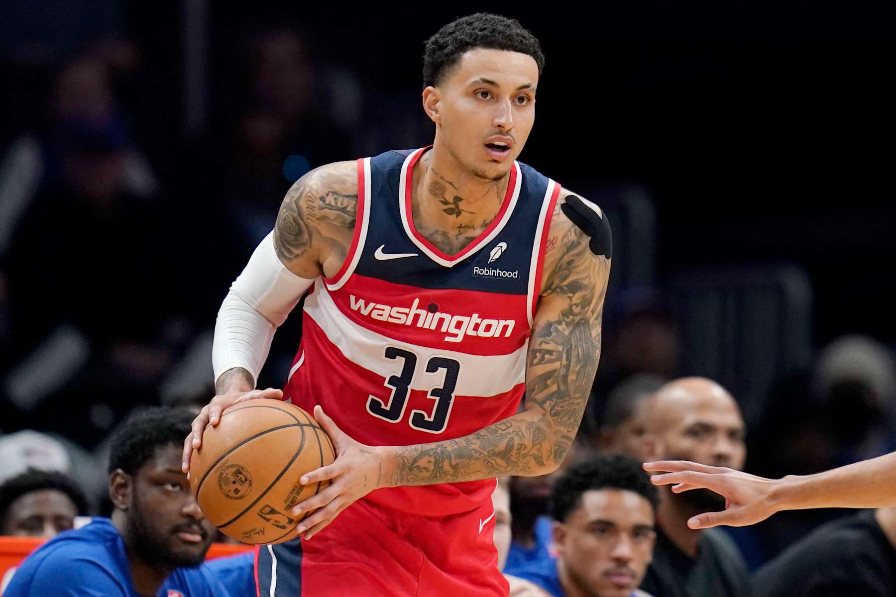 WASHINGTON, DC - MARCH 29: Kyle Kuzma #33 of the Washington Wizards looks to pass during the first half against the Detroit Pistons at Capital One Arena on March 29, 2024 in Washington, DC. NOTE TO USER: User expressly acknowledges and agrees that, by downloading and or using this photograph, User is consenting to the terms and conditions of the Getty Images License Agreement. (Photo by Jess Rapfogel/Getty Images)