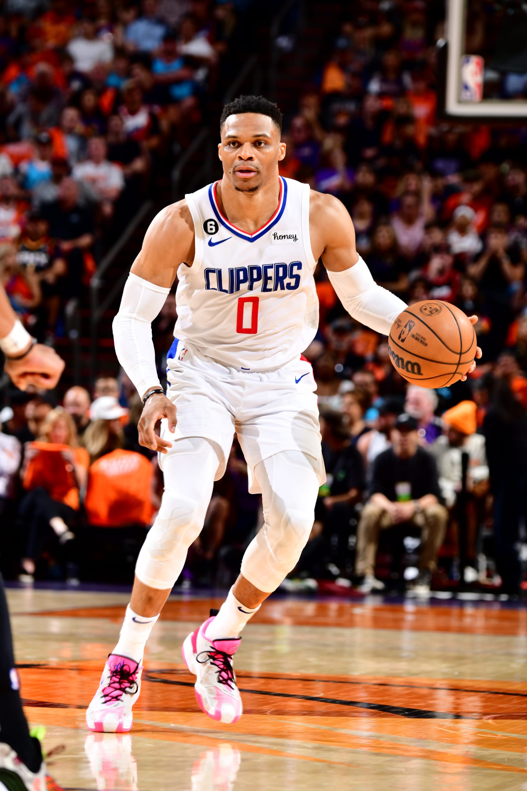 PHOENIX, AZ - APRIL 25: Russell Westbrook  #0 of the LA Clippers dribbles the ball during the game against the Phoenix Suns during Round 1 Game 5 of the 2023 NBA Playoffs on April 25, 2023 at Footprint Center in Phoenix, Arizona. NOTE TO USER: User expressly acknowledges and agrees that, by downloading and or using this photograph, user is consenting to the terms and conditions of the Getty Images License Agreement. Mandatory Copyright Notice: Copyright 2023 NBAE (Photo by Barry Gossage/NBAE via Getty Images)