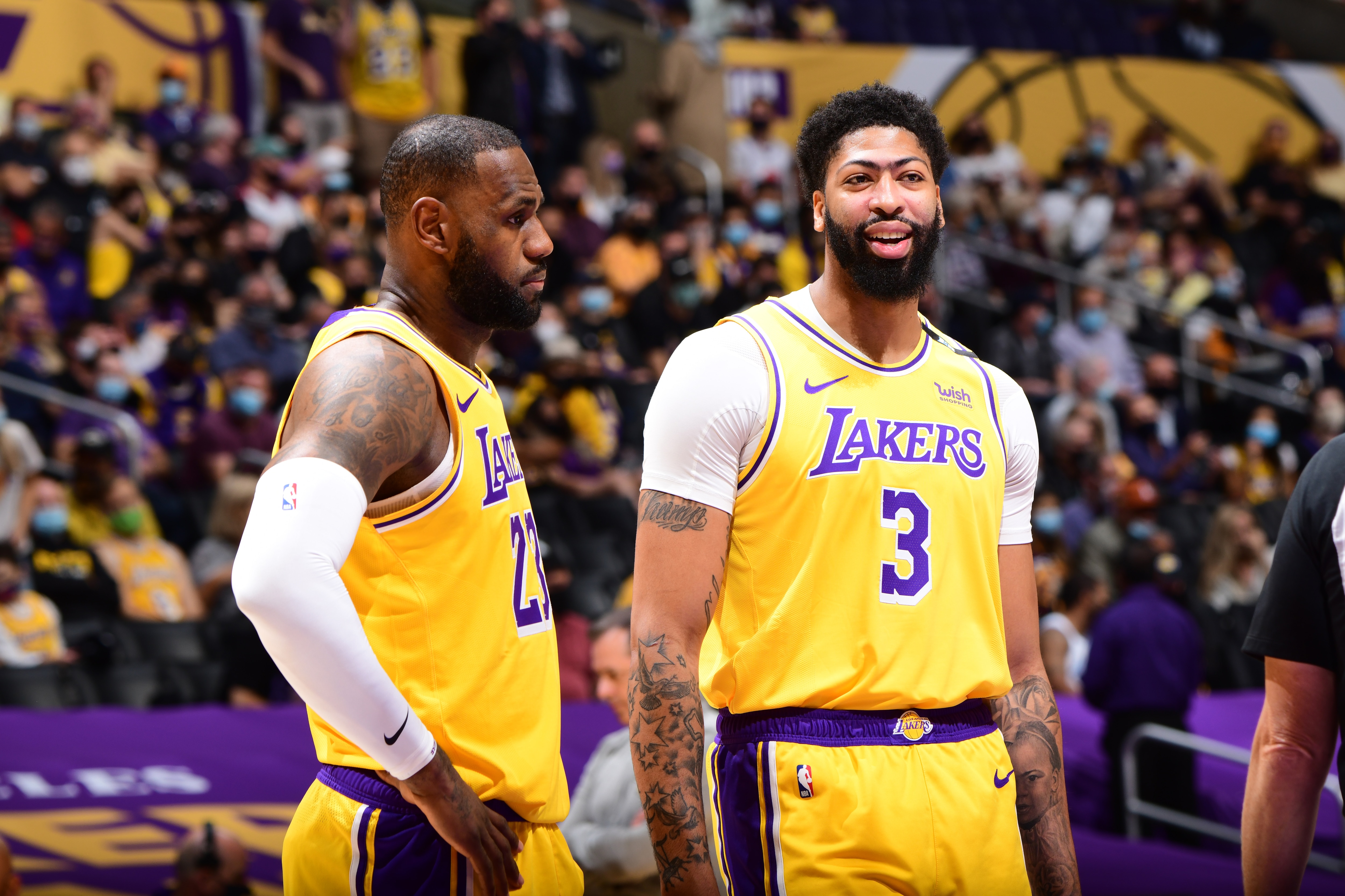LOS ANGELES, CA - MAY 27: LeBron James #23 and Anthony Davis #3 of the Los Angeles Lakers look on before the game against the Phoenix Suns during Round 1, Game 3 of the 2021 NBA Playoffs on May 27, 2021 at STAPLES Center in Los Angeles, California. NOTE TO USER: User expressly acknowledges and agrees that, by downloading and/or using this Photograph, user is consenting to the terms and conditions of the Getty Images License Agreement. Mandatory Copyright Notice: Copyright 2021 NBAE (Photo by Adam Pantozzi/NBAE via Getty Images)