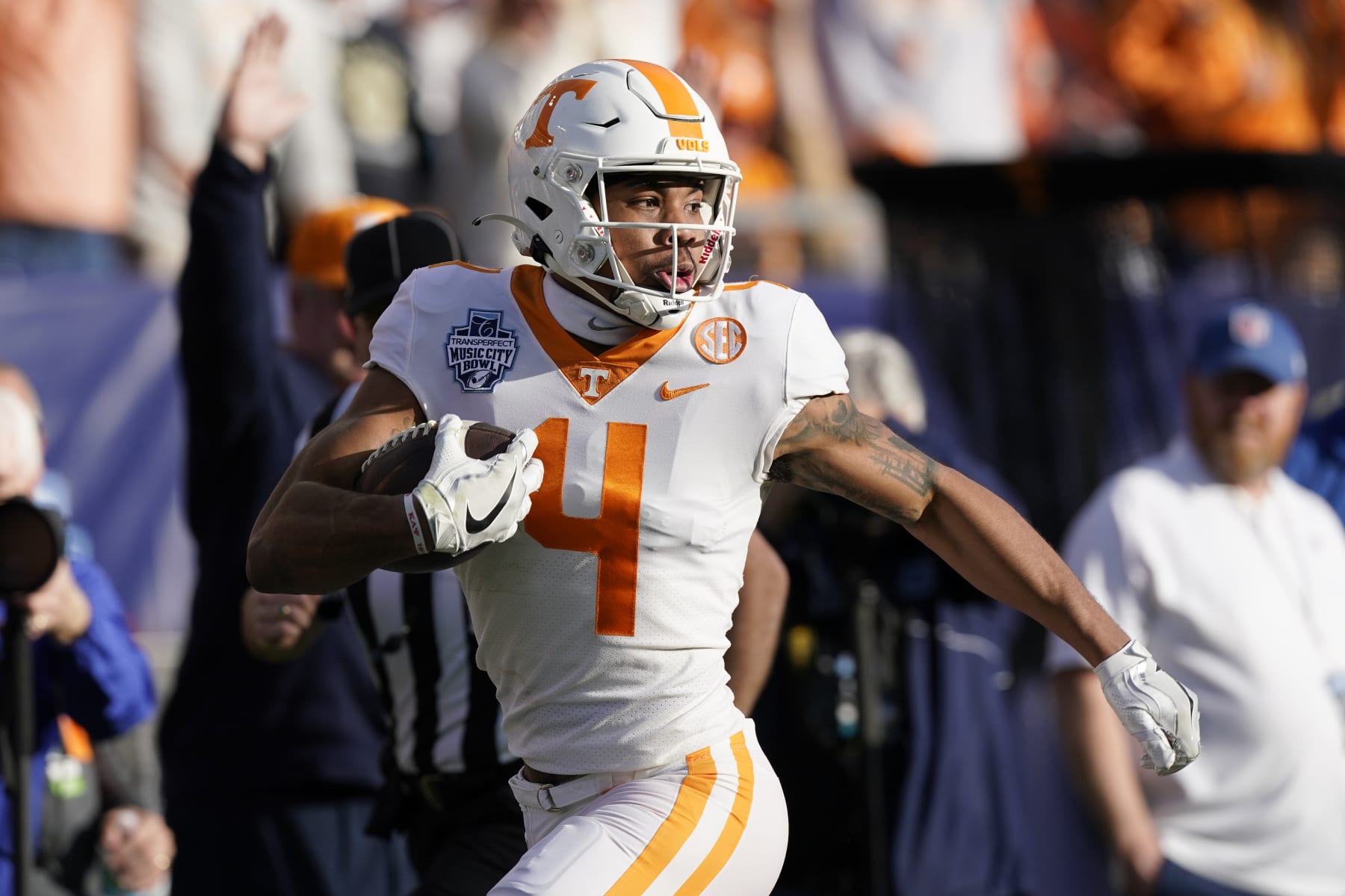 Tennessee wide receiver Cedric Tillman scores a touchdown against Purdue on a 61-yard pass play in the first half of the Music City Bowl NCAA college football game Thursday, Dec. 30, 2021, in Nashville, Tenn. (AP Photo/Mark Humphrey)
