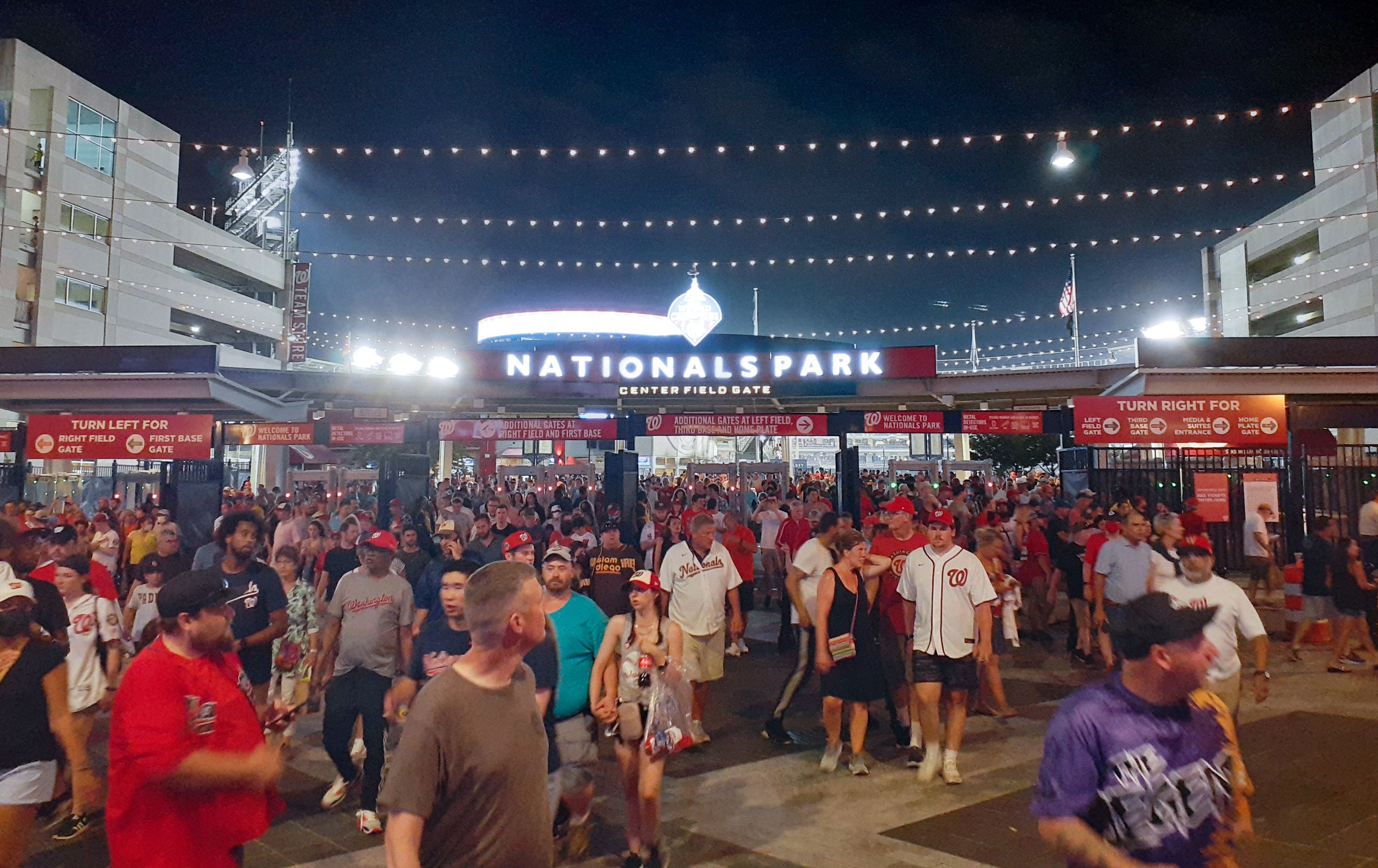 People are seen leaving the Nationals Park stadium as the game between the Nationals and the San Diego Padres was interrupted due to a shooting outside the stadium in Washington, DC, on July 17, 2021. - Four people were shot outside a baseball stadium crowded with thousands of spectators in the US capital on Saturday, causing the game to be abruptly halted as spectators were ushered out.
Police said four people had been shot but there was "no ongoing threat", without clarifying the condition of the gunshot victims. (Photo by Ben Sheppard / AFP) / The erroneous mention[s] appearing in the metadata of this photo by Ben Sheppard has been modified in AFP systems in the following manner: [July 17] instead of [July 15]. Please immediately remove the erroneous mention[s] from all your online services and delete it (them) from your servers. If you have been authorized by AFP to distribute it (them) to third parties, please ensure that the same actions are carried out by them. Failure to promptly comply with these instructions will entail liability on your part for any continued or post notification usage. Therefore we thank you very much for all your attention and prompt action. We are sorry for the inconvenience this notification may cause and remain at your disposal for any further information you may require. (Photo by BEN SHEPPARD/AFP via Getty Images)