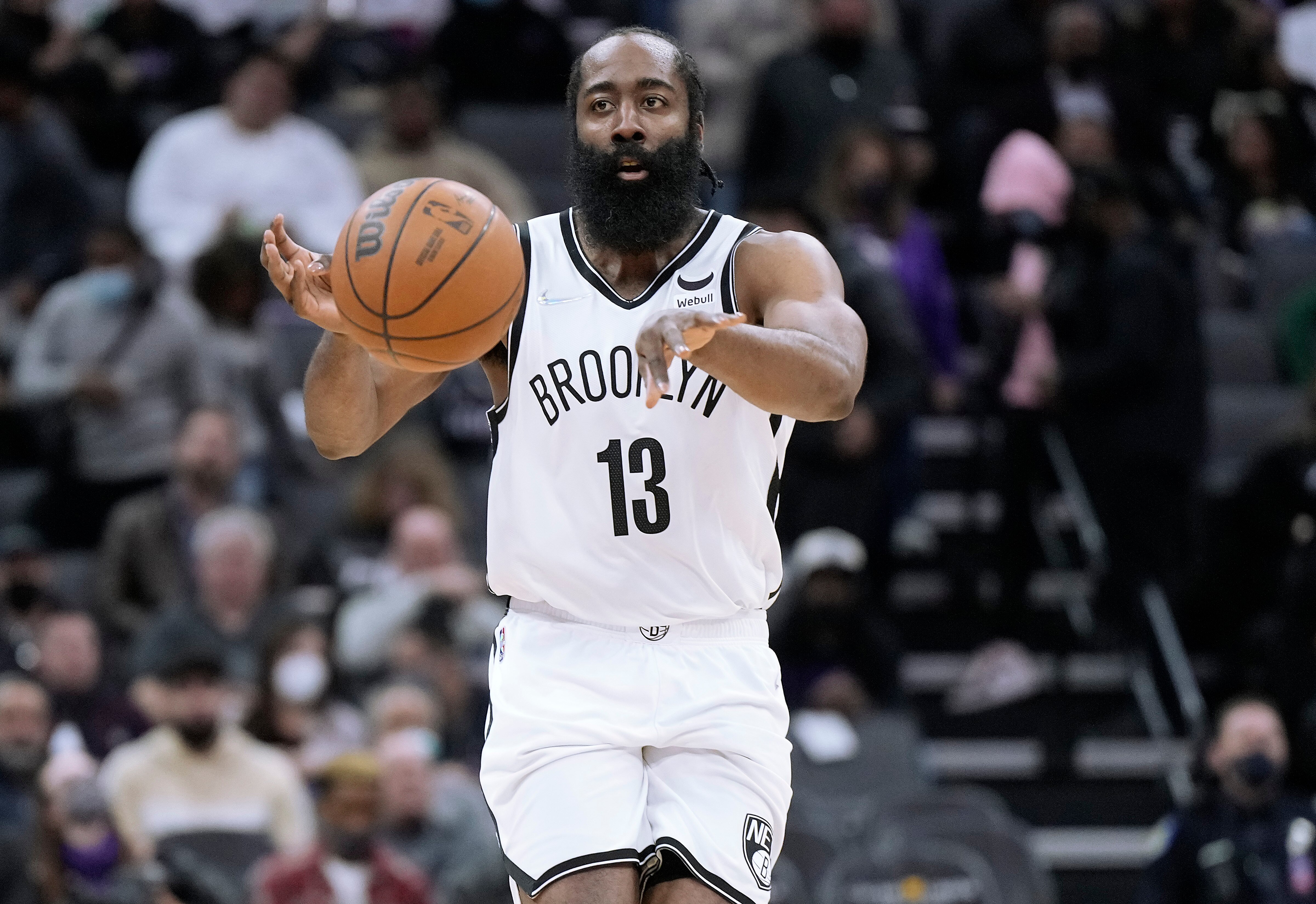 SACRAMENTO, CALIFORNIA - FEBRUARY 02: James Harden #13 of the Brooklyn Nets passes the ball against the Sacramento Kings during the second half of their game at Golden 1 Center on February 02, 2022 in Sacramento, California. NOTE TO USER: User expressly acknowledges and agrees that, by downloading and or using this photograph, User is consenting to the terms and conditions of the Getty Images License Agreement. (Photo by Thearon W. Henderson/Getty Images)