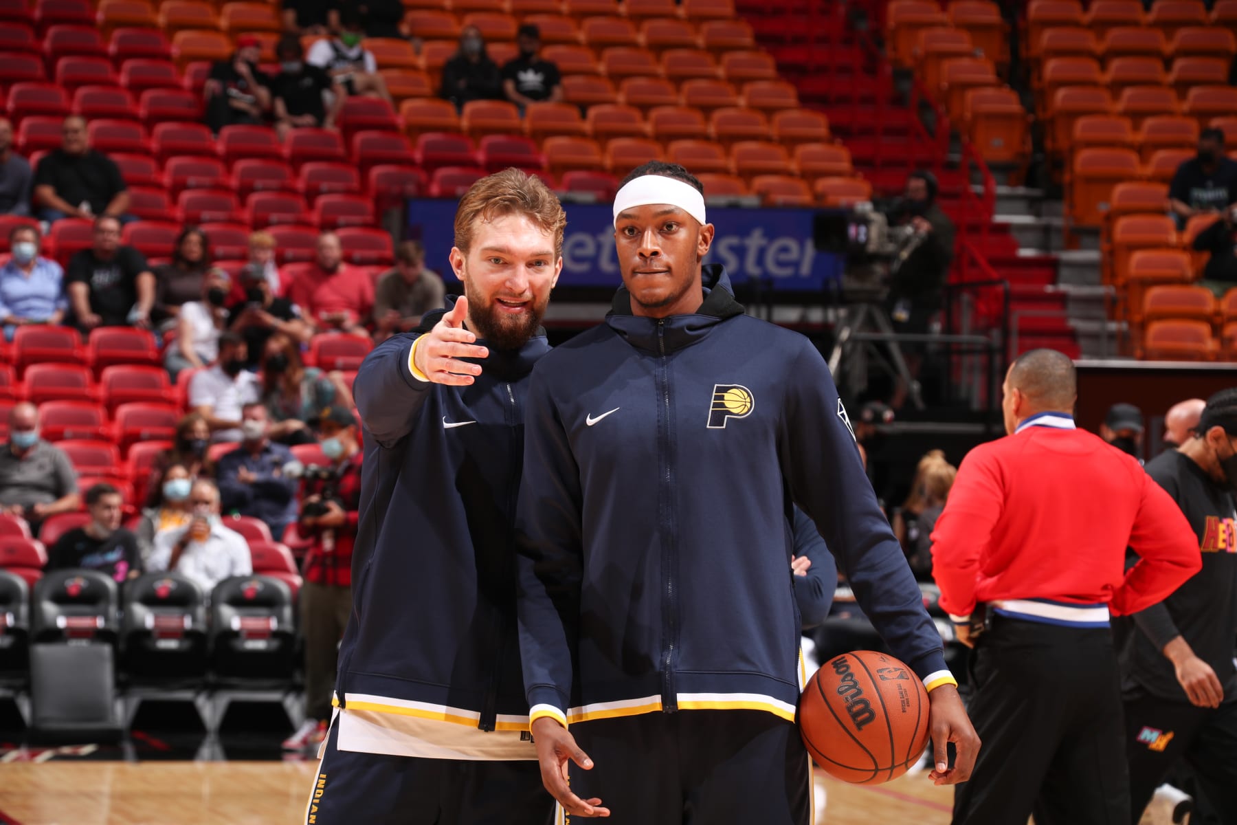 MIAMI, FL - DECEMBER 21: Domantas Sabonis #11 of the Indiana Pacers talks to Myles Turner #33 of the Indiana Pacers before the game against the Miami Heat on December 21, 2021 at FTX Arena in Miami, Florida. NOTE TO USER: User expressly acknowledges and agrees that, by downloading and or using this Photograph, user is consenting to the terms and conditions of the Getty Images License Agreement. Mandatory Copyright Notice: Copyright 2021 NBAE (Photo by Issac Baldizon/NBAE via Getty Images)