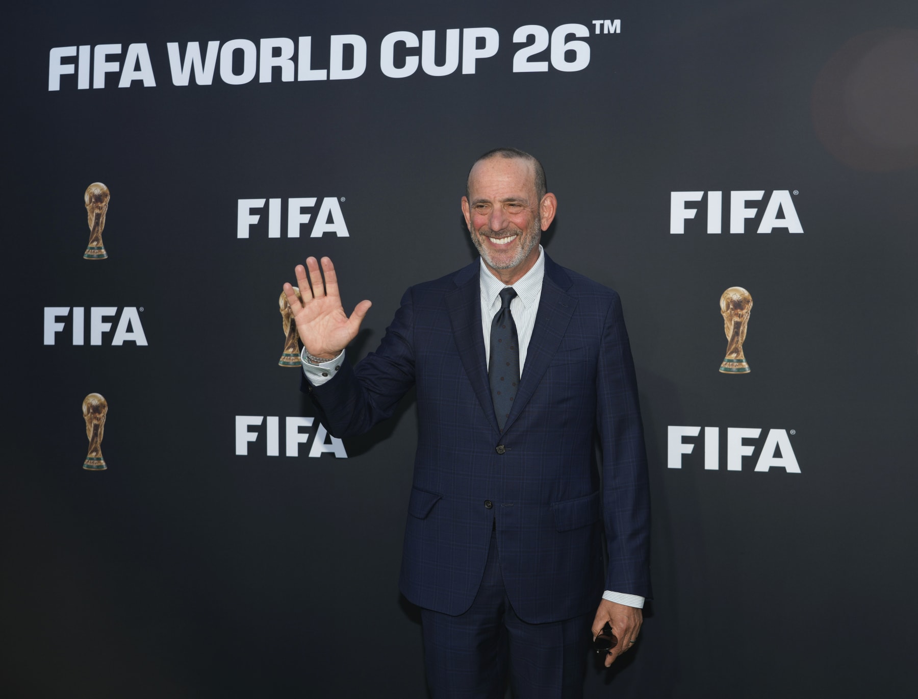 MLS Commissioner Don Garber arrives for a ceremony unveiling the official brand of soccer's 2026 World Cup, at Griffith Observatory in Los Angeles Wednesday, May 17, 2023. (AP Photo/Jae C. Hong)