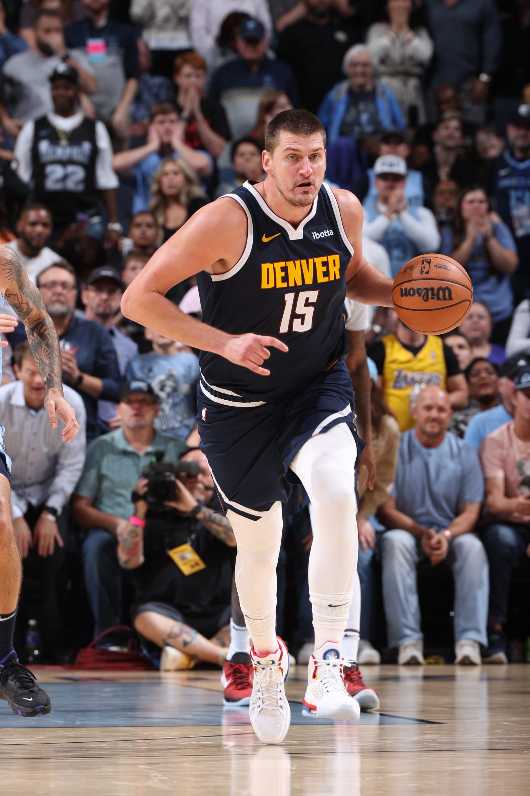 MEMPHIS, TN - OCTOBER 27: Nikola Jokic #15 of the Denver Nuggets dribbles the ball during the game against the Memphis Grizzlies on October 27, 2023 at FedExForum in Memphis, Tennessee. NOTE TO USER: User expressly acknowledges and agrees that, by downloading and or using this photograph, User is consenting to the terms and conditions of the Getty Images License Agreement. Mandatory Copyright Notice: Copyright 2023 NBAE (Photo by Joe Murphy/NBAE via Getty Images)