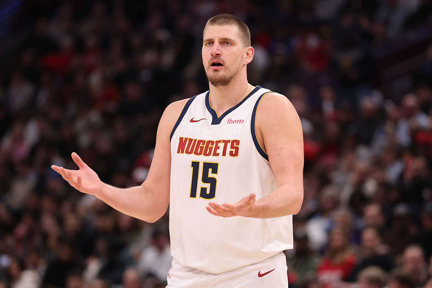 CHICAGO, ILLINOIS - JANUARY 27: Nikola Jokic #15 of the Denver Nuggets reacts against the Chicago Bulls during the first half at the United Center on January 27, 2025 in Chicago, Illinois. NOTE TO USER: User expressly acknowledges and agrees that, by downloading and or using this photograph, User is consenting to the terms and conditions of the Getty Images License Agreement.  (Photo by Michael Reaves/Getty Images)