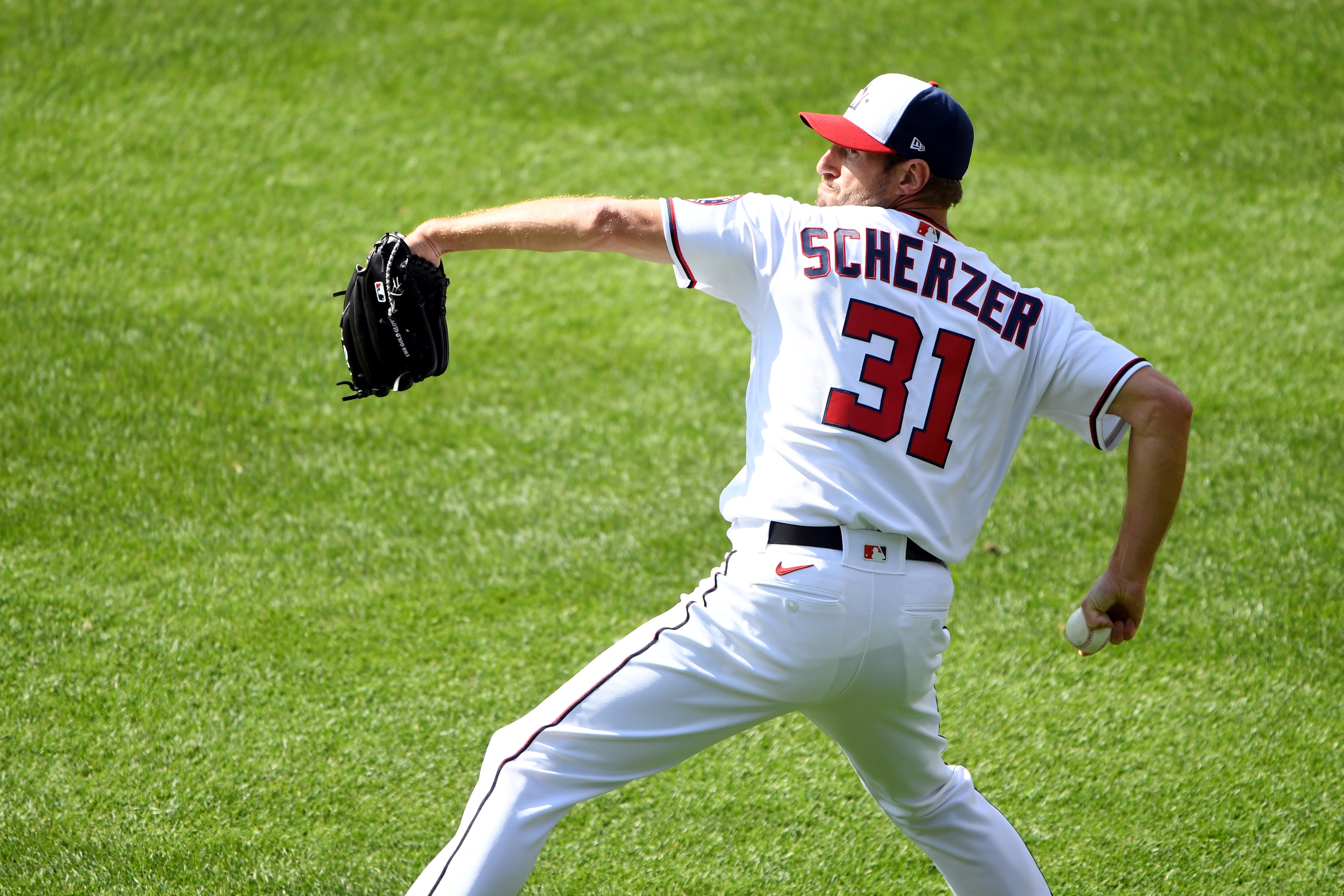 WASHINGTON, DC - APRIL 06:  Max Scherzer #31 of the Washington Nationals warms up in the outfield prior to the game between the Atlanta Braves and the Washington Nationals at Nationals Park on Tuesday, April 6, 2021 in Washington, District of Columbia. (Photo by Will Newton/MLB Photos via Getty Images)