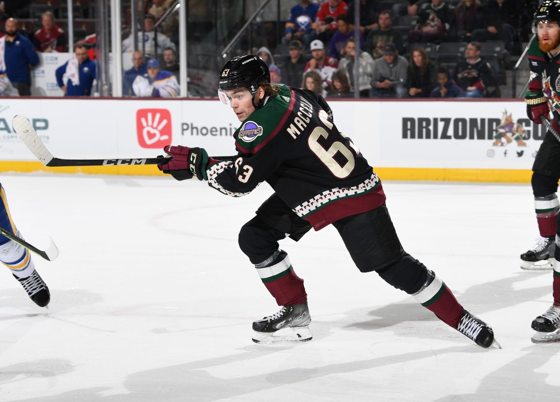 TEMPE, ARIZONA - DECEMBER 17: Matias Maccelli #63 of the Arizona Coyotes gets ready during a face off against the Buffalo Sabres at Mullett Arena on December 17, 2022 in Tempe, Arizona. (Photo by Norm Hall/NHLI via Getty Images)