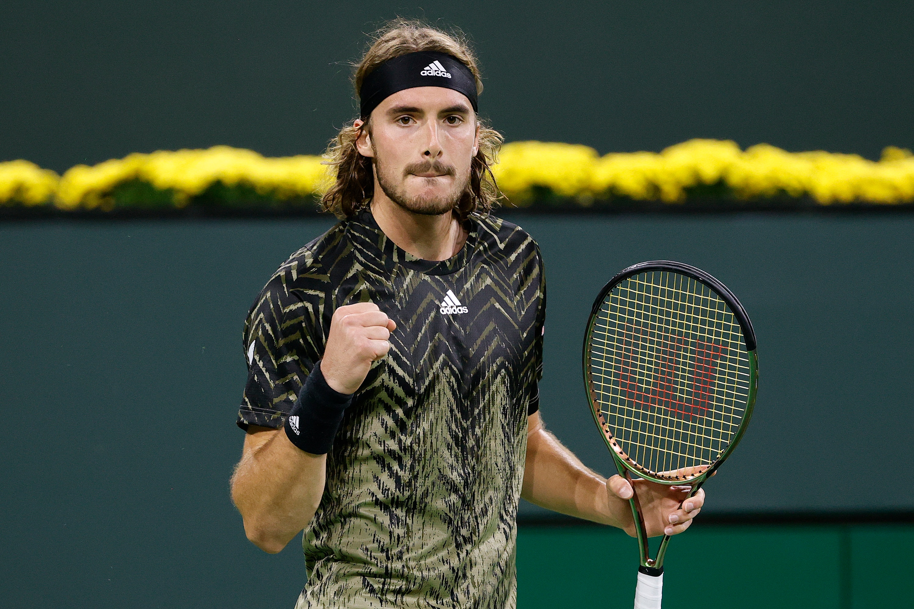 INDIAN WELLS, CALIFORNIA - OCTOBER 10: Stefanos Tsitsipas of Greece celebrates during a match against Pedro Martínez of Spain during the BNP Paribas Open at the Indian Wells Tennis Garden on October 10, 2021 in Indian Wells, California. (Photo by Tim Nwachukwu/Getty Images)