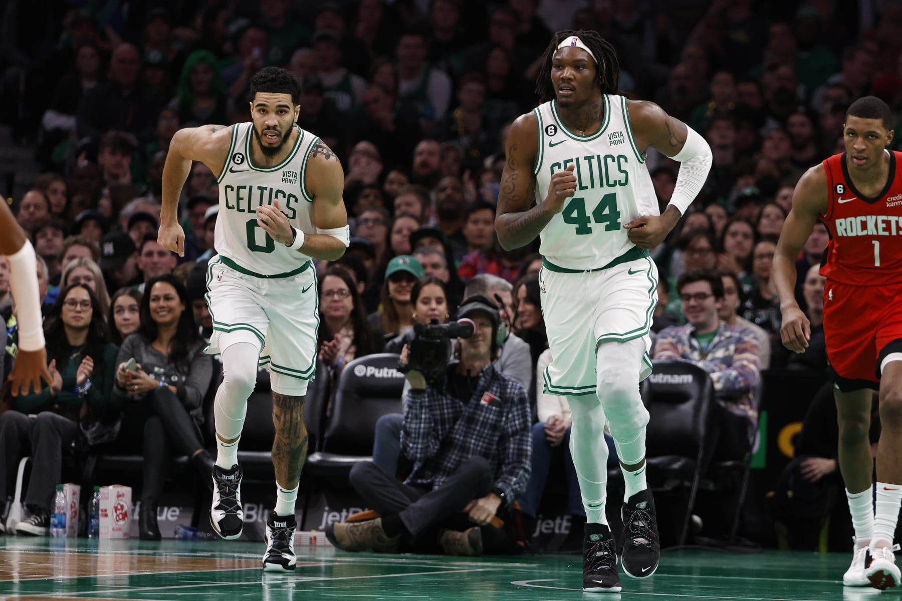 BOSTON, MA - DECEMBER 27: Jayson Tatum #0 of the Boston Celtics and Robert Williams III #44 head up court against the Houston Rockets during the second half at TD Garden on December 27, 2022 in Boston, Massachusetts. NOTE TO USER: User expressly acknowledges and agrees that, by downloading and/or using this Photograph, user is consenting to the terms and conditions of the Getty Images License Agreement. (Photo By Winslow Townson/Getty Images)