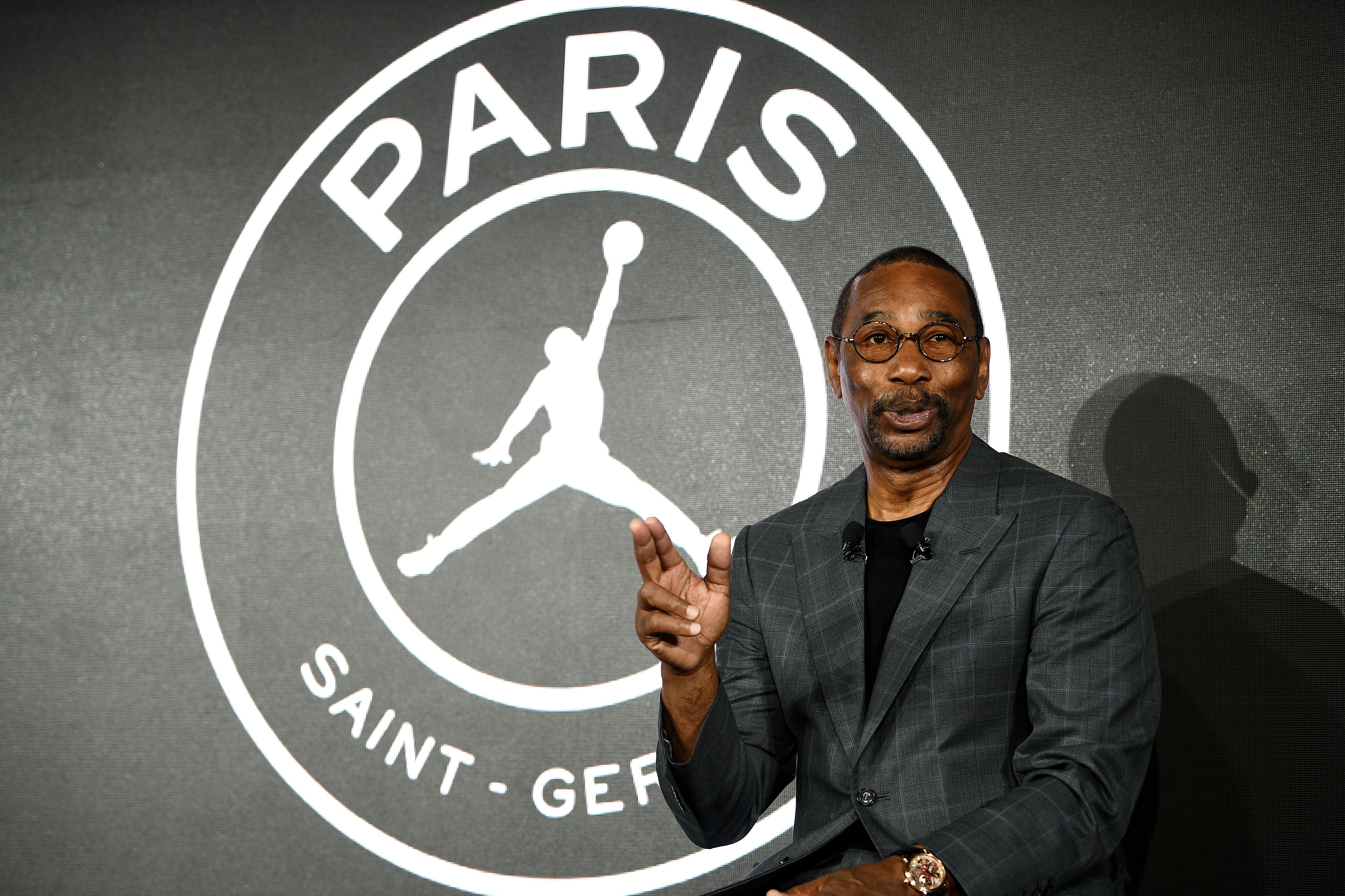 The Jordan Brand's president Larry Miller speaks at the Parc des Princes stadium in Paris on September 13, 2018 during the presentation of Paris Saint-Germain's UEFA Champions League new jerseys made in partnership with the Jordan Brand, created by the Chicago Bulls' basketball legend. (Photo by FRANCK FIFE / AFP)        (Photo credit should read FRANCK FIFE/AFP via Getty Images)