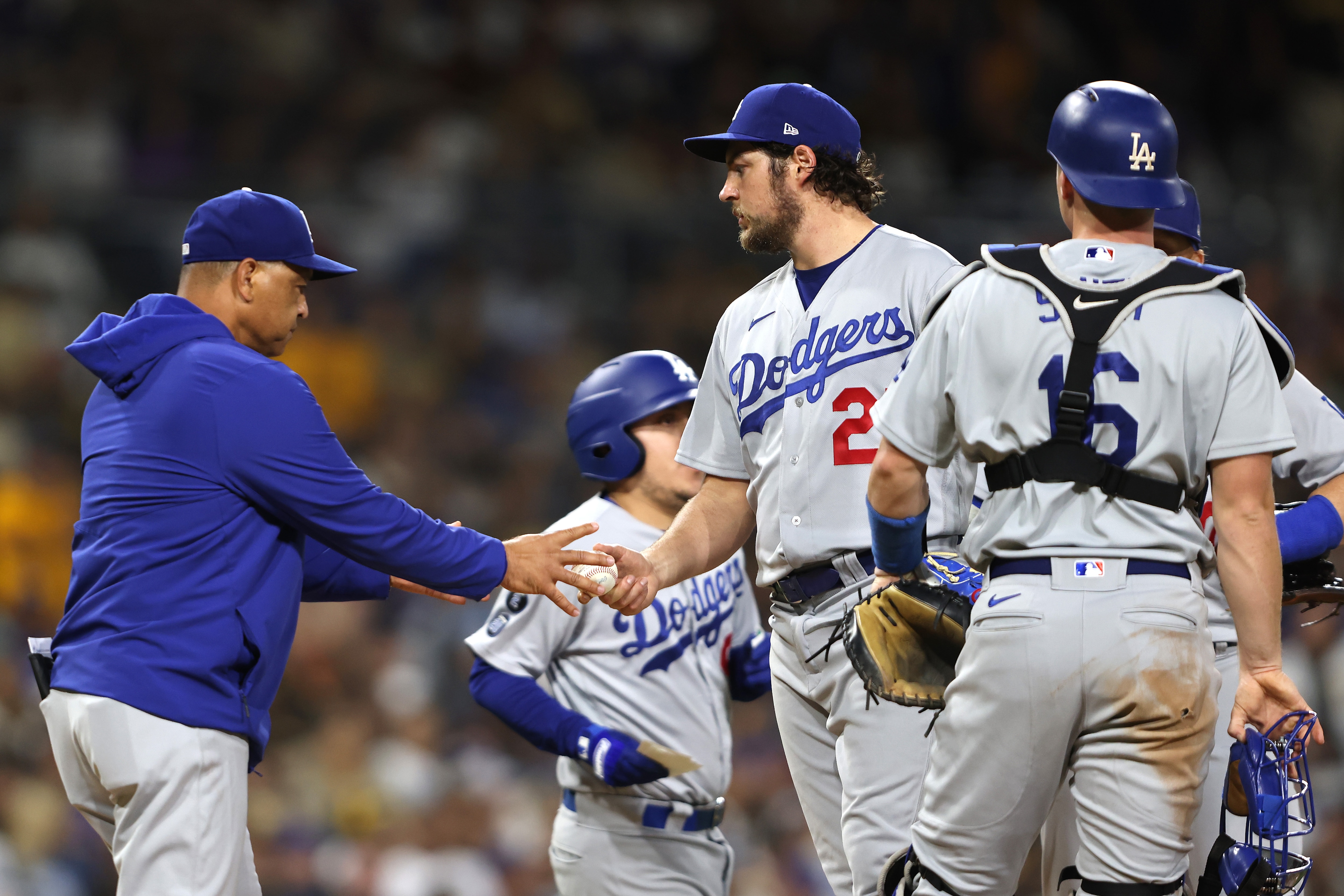 SAN DIEGO, CALIFORNIA - JUNE 23: Manager Dave Roberts relieves Trevor Bauer #27 of the Los Angeles Dodgers during the seventh inning of a game against the San Diego Padres at PETCO Park on June 23, 2021 in San Diego, California. (Photo by Sean M. Haffey/Getty Images)