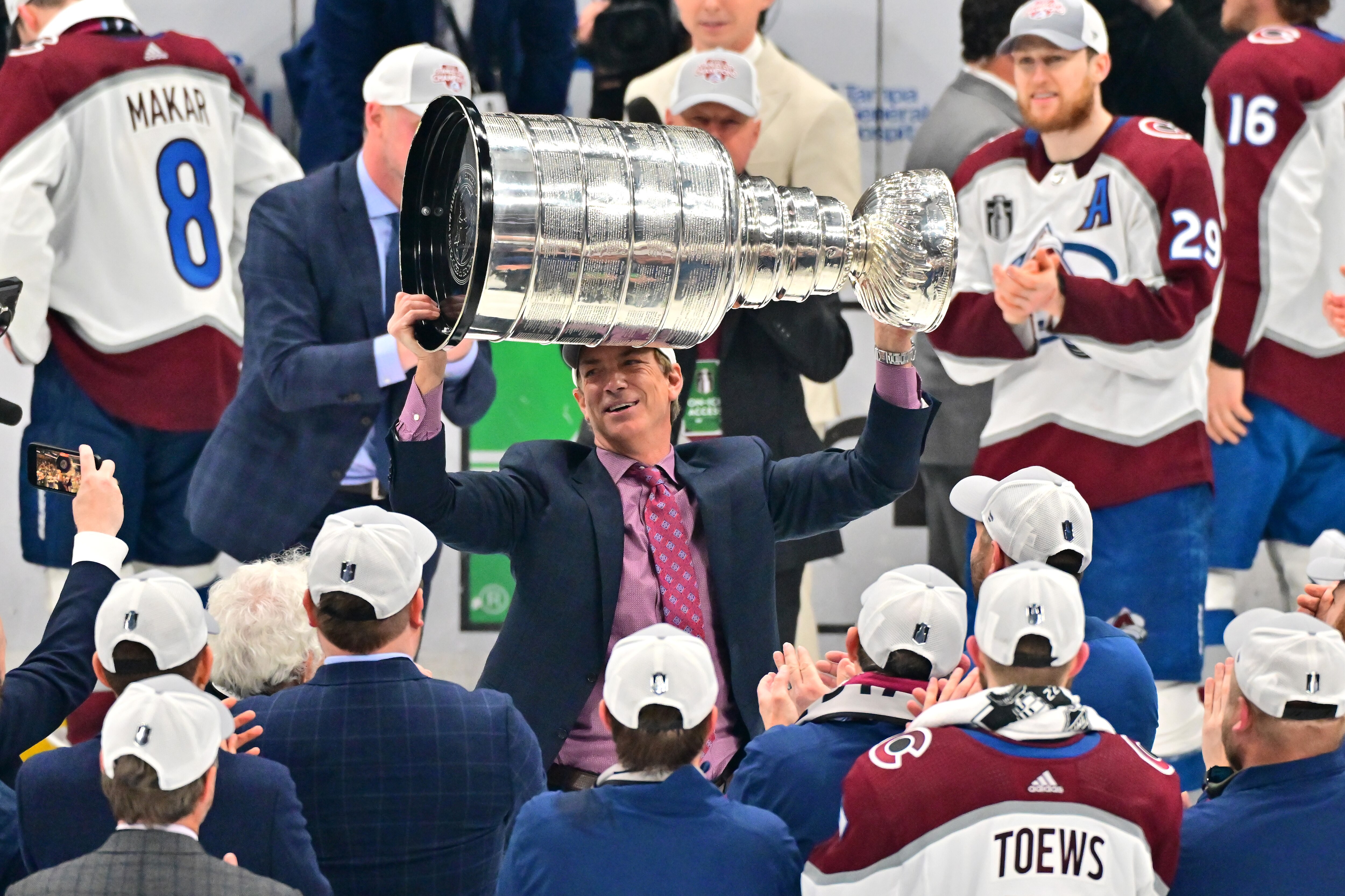 TAMPA, FLORIDA - JUNE 26: General Manager Joe Sakic of the Colorado Avalanche lifts the Stanley Cup after defeating the Tampa Bay Lightning 2-1 in Game Six of the 2022 NHL Stanley Cup Final at Amalie Arena on June 26, 2022 in Tampa, Florida. (Photo by Julio Aguilar/Getty Images)