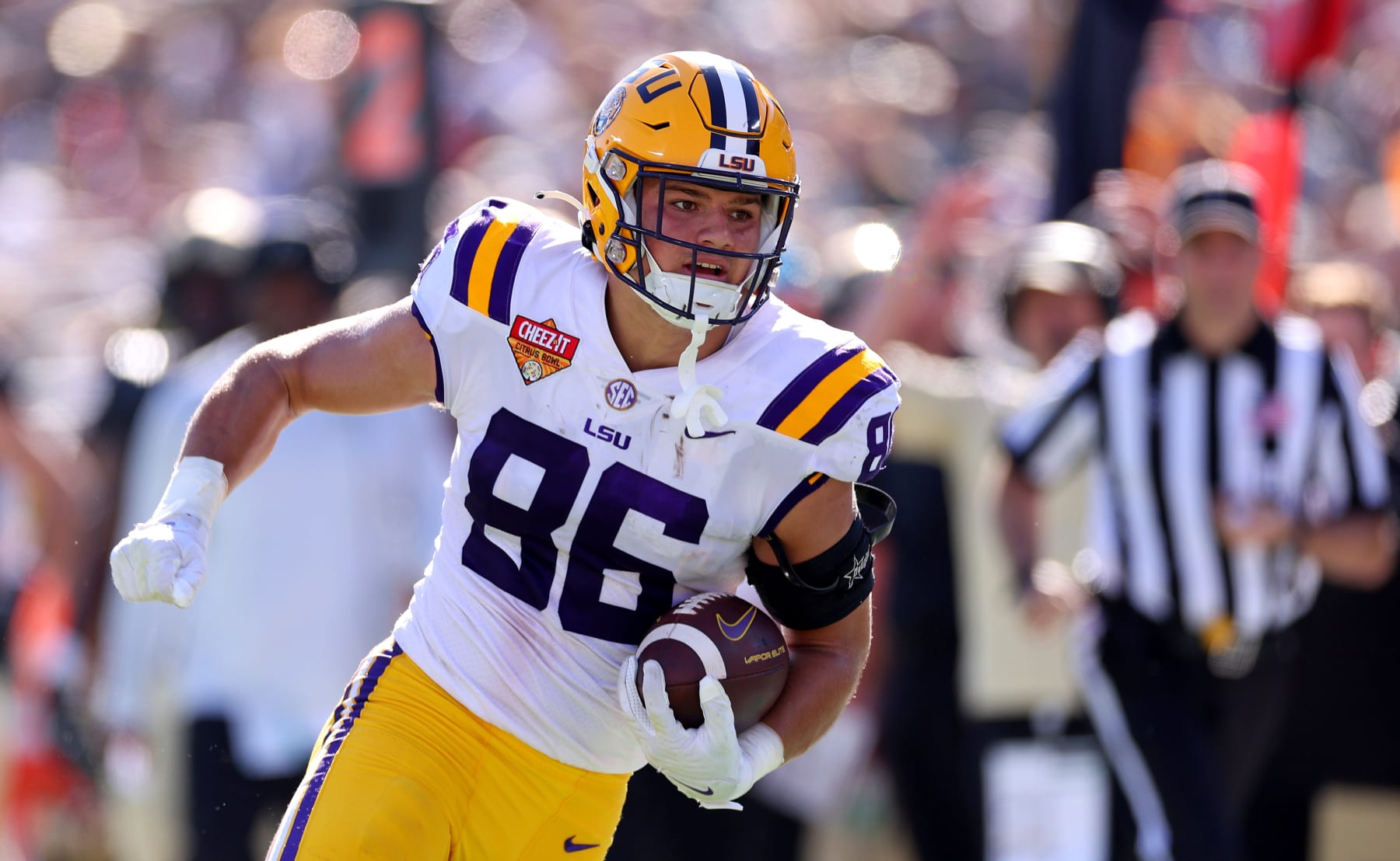 ORLANDO, FLORIDA - JANUARY 02: Mason Taylor #86 of the LSU Tigers scores a touchdown during the Cheez-It Citrus Bowl against the Purdue Boilermakers at Camping World Stadium on January 02, 2023 in Orlando, Florida. (Photo by Mike Ehrmann/Getty Images)