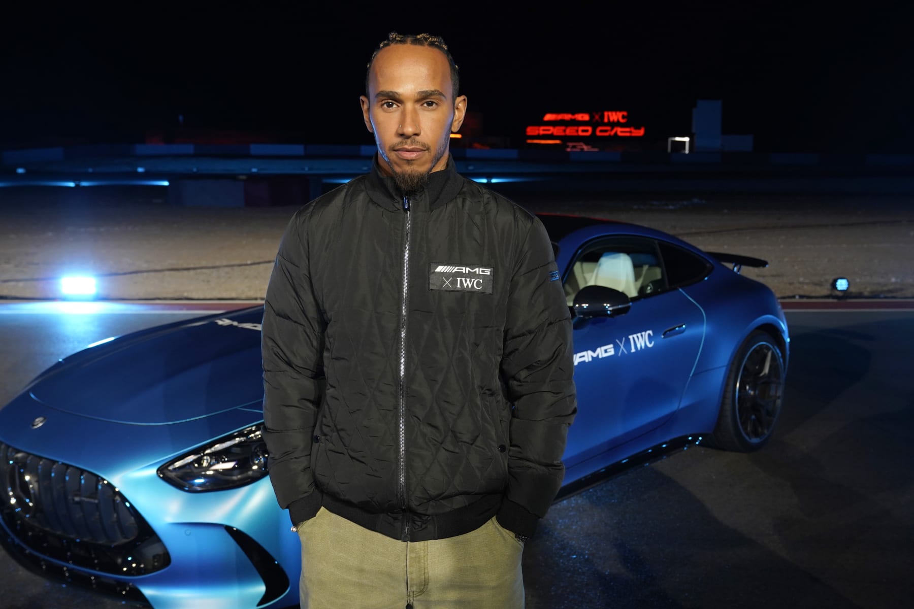LAS VEGAS, NEVADA - NOVEMBER 14: Lewis Hamilton attends an exclusive event organized by IWC Schaffhausen and Mercedes-AMG at "Speed City” on November 14, 2023 in Las Vegas, Nevada. Ahead of the Grand Prix, Speed City is an outdoor desert camp and entertainment venue taking over the famous Speedvegas racetrack. (Photo by Presley Ann/Getty Images for IWC Schaffhausen)