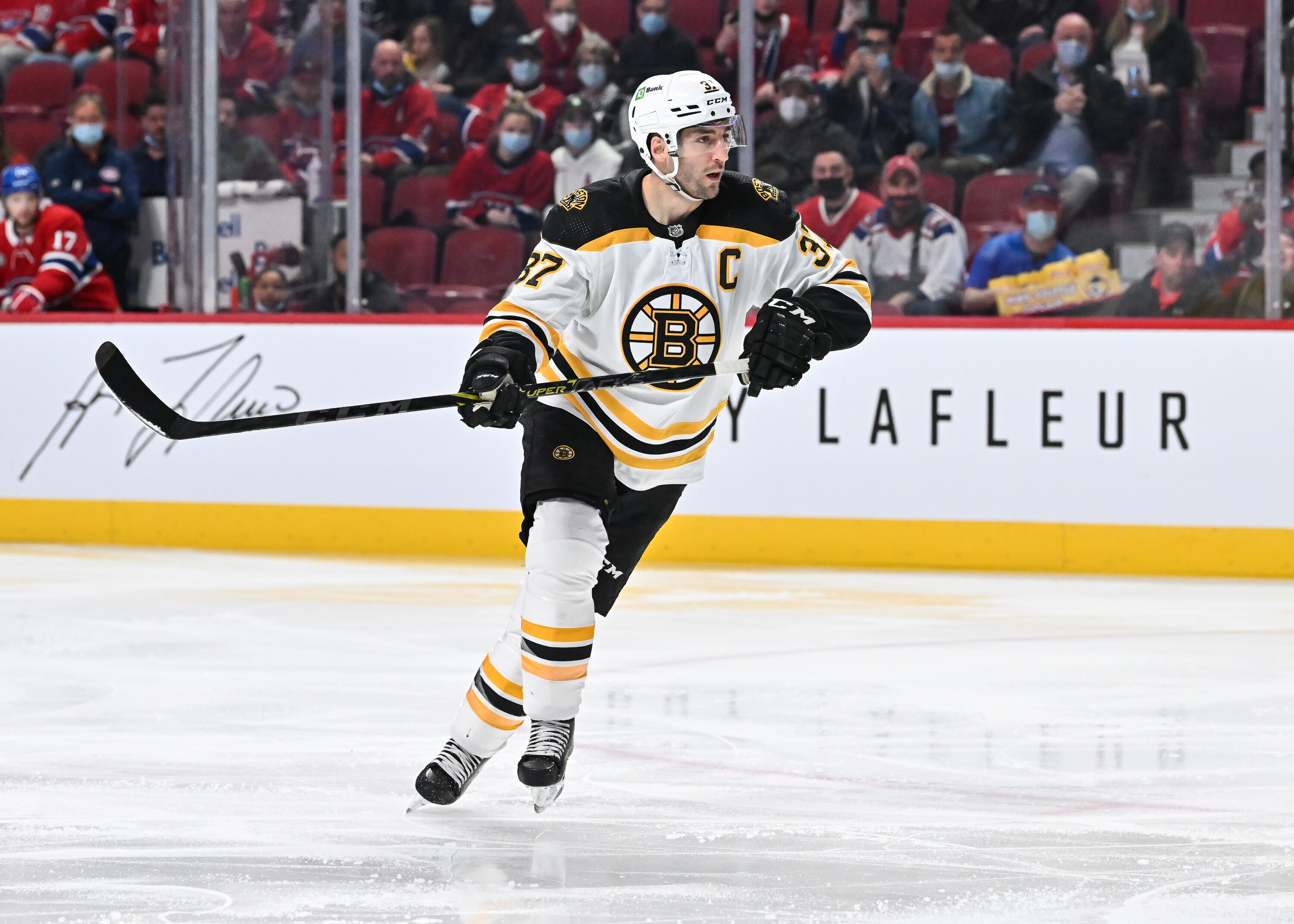 MONTREAL, QC - APRIL 24:  Patrice Bergeron #37 of the Boston Bruins skates against the Montreal Canadiens during the second period at Centre Bell on April 24, 2022 in Montreal, Canada.  The Boston Bruins defeated the Montreal Canadiens 5-3.  (Photo by Minas Panagiotakis/Getty Images)