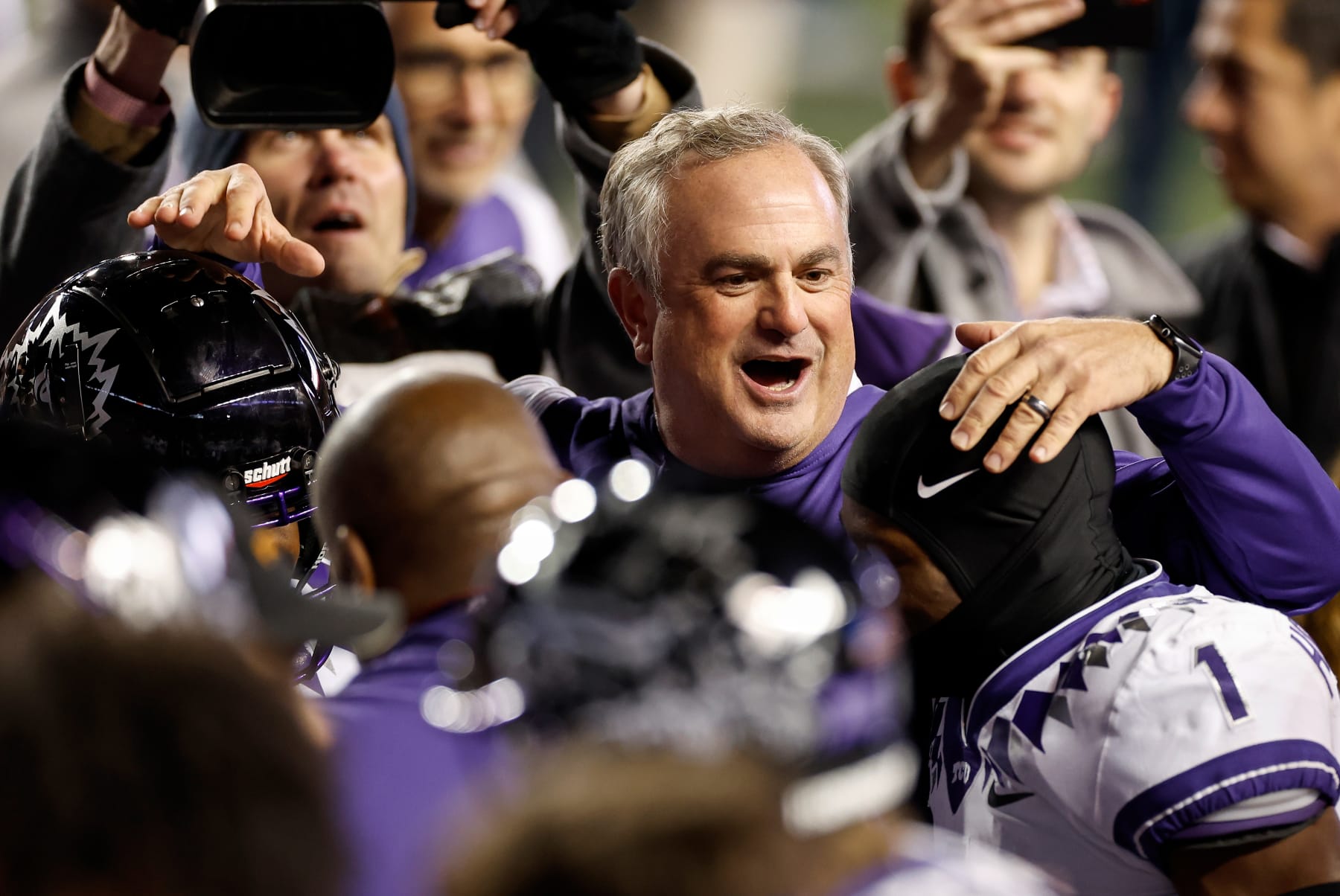 AUSTIN, TEXAS - NOVEMBER 12: Head coach Sonny Dykes of the TCU Horned Frogs celebrates with the team after defeating the Texas Longhorns at Darrell K Royal-Texas Memorial Stadium on November 12, 2022 in Austin, Texas. (Photo by Tim Warner/Getty Images)